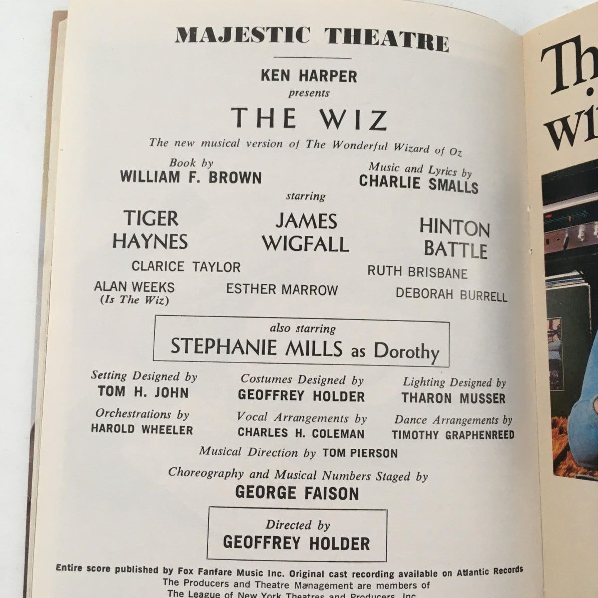 1976 Playbill for The Wiz by Ken Harper at Majestic Theatre, featuring cast and creative team details including Stephanie Mills as Dorothy, showcasing artistic presentation and background colors.