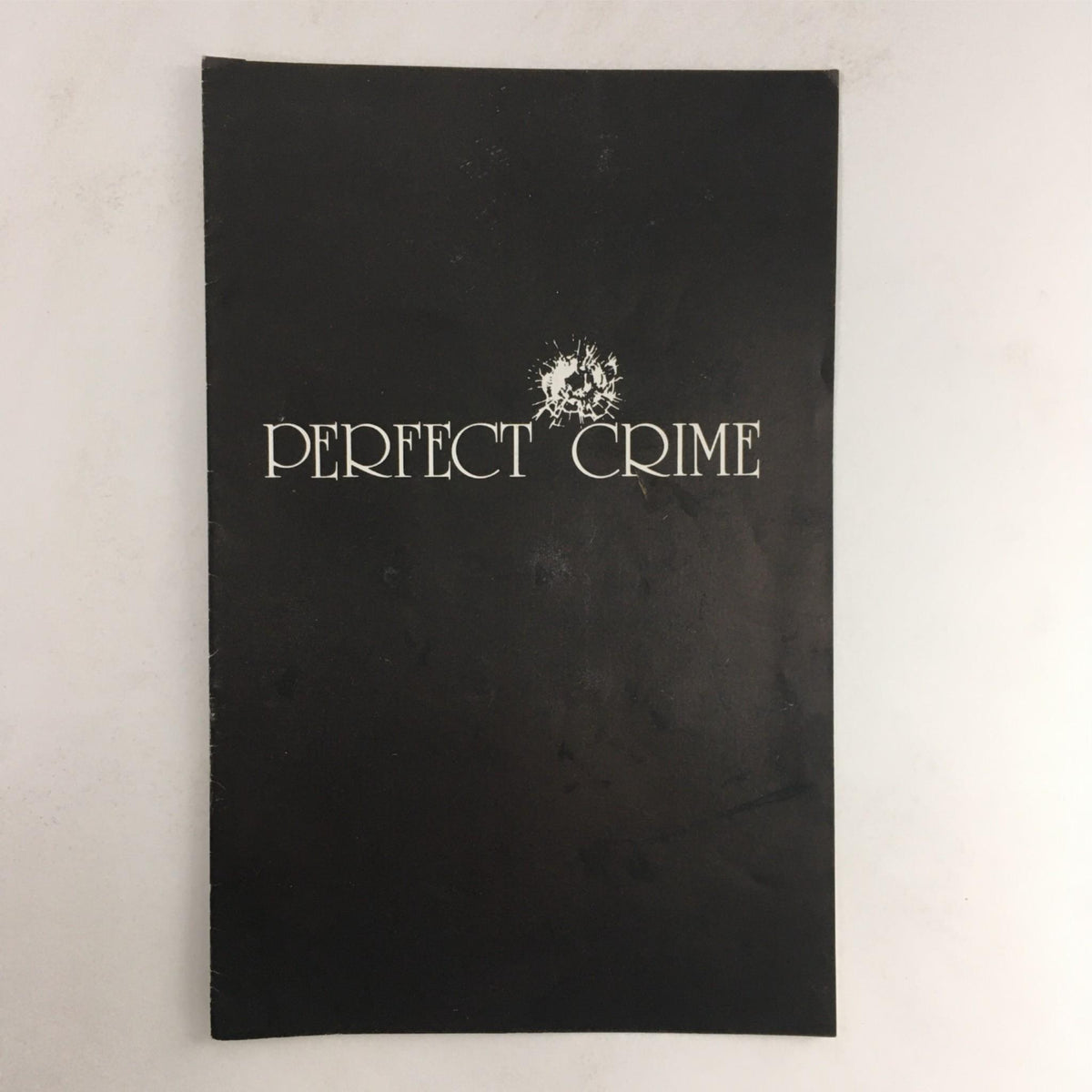 Cover of the 1987 Perfect Crime magazine by Warren Manzi and Jeffrey Hyatt featuring the title 'Perfect Crime' in a minimalistic design, ideal for theater enthusiasts and vintage magazine collectors.