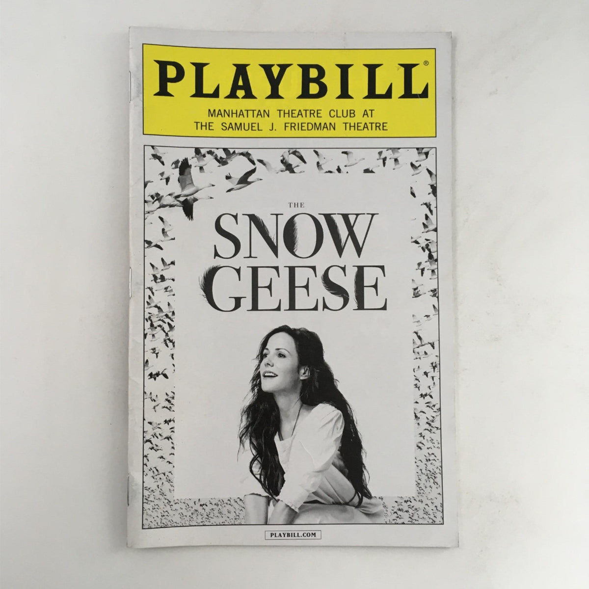 2013 Playbill for The Snow Geese by Sharr White featuring a black and white cover image with the title prominently displayed and a female character in a serene expression.