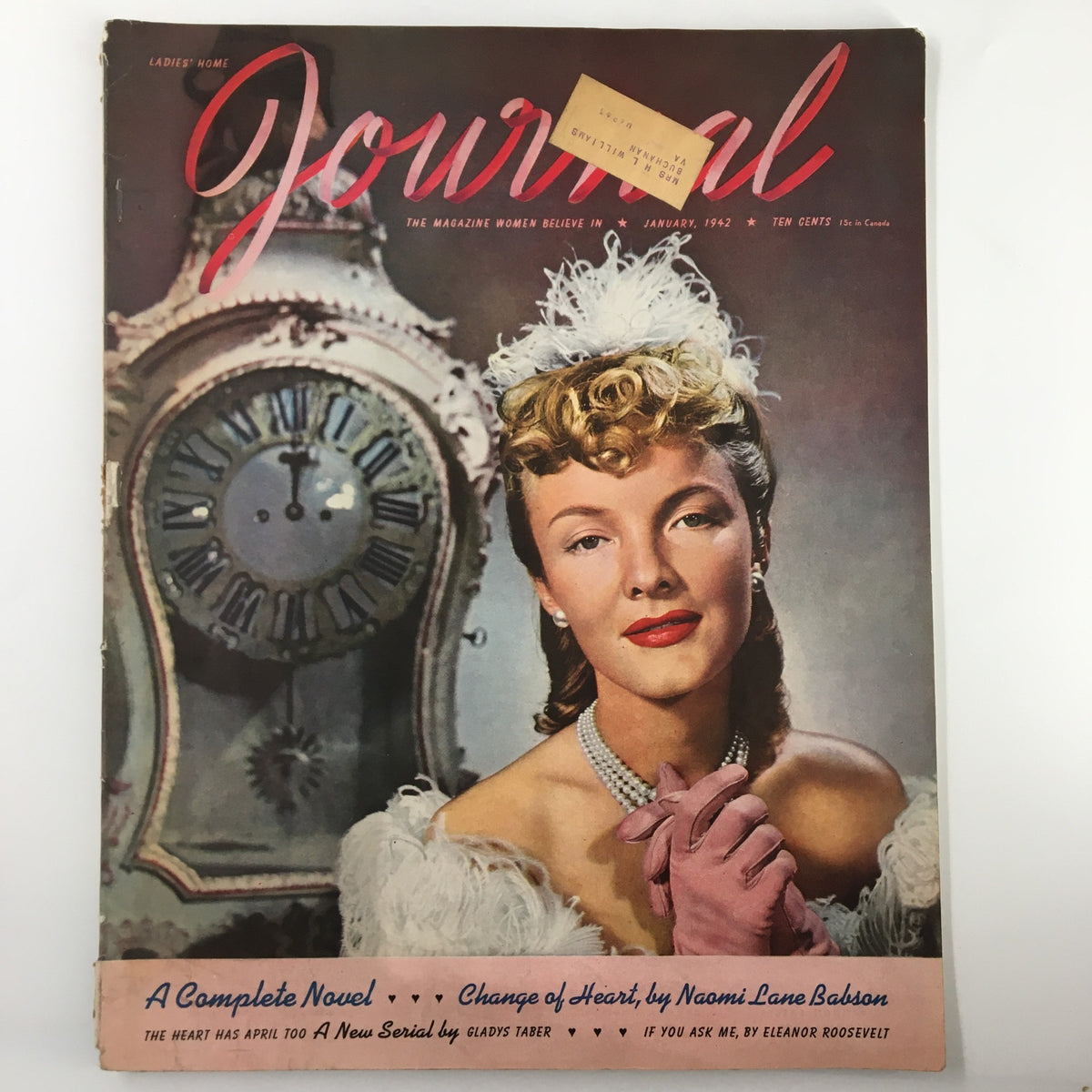 Cover of Ladies' Home Journal Magazine January 1942 featuring the story 'Change of Heart' by Naomi Lane Babson, showcasing a woman with vintage hairstyle and attire, alongside a classic clock.
