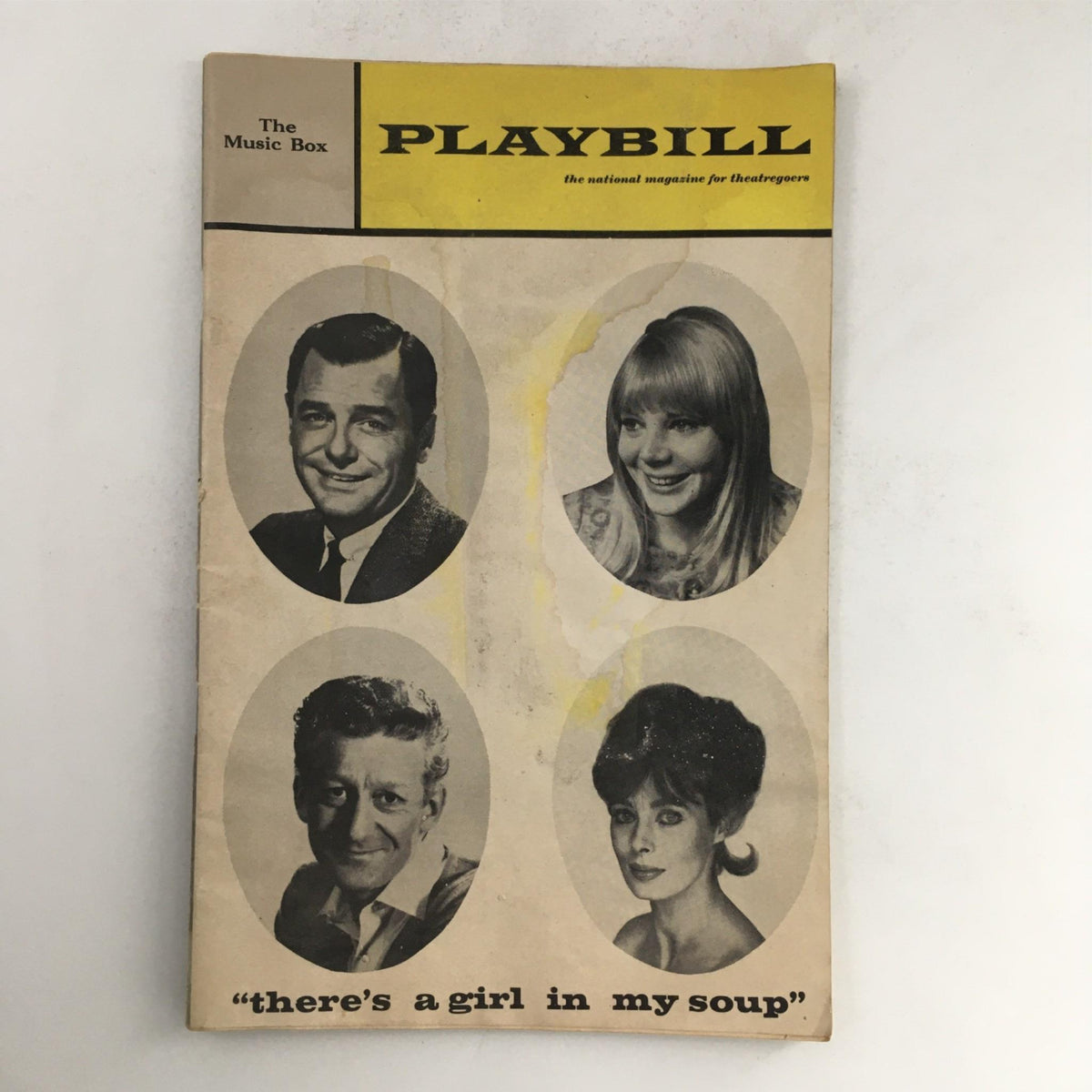 1967 Playbill for There's A Girl In My Soup, featuring the cast portraits and title at The Music Box, showcasing classic theatrical design.