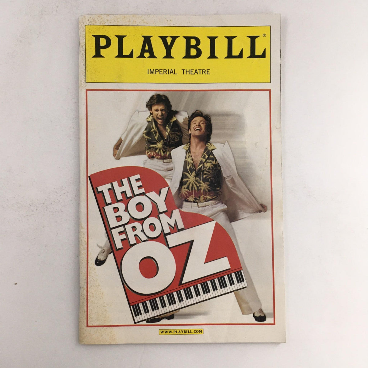 2003 Playbill for The Boy from OZ featuring Hugh Jackman and Philip McKinley at Imperial Theatre, showcasing the colorful cover design and iconic title.