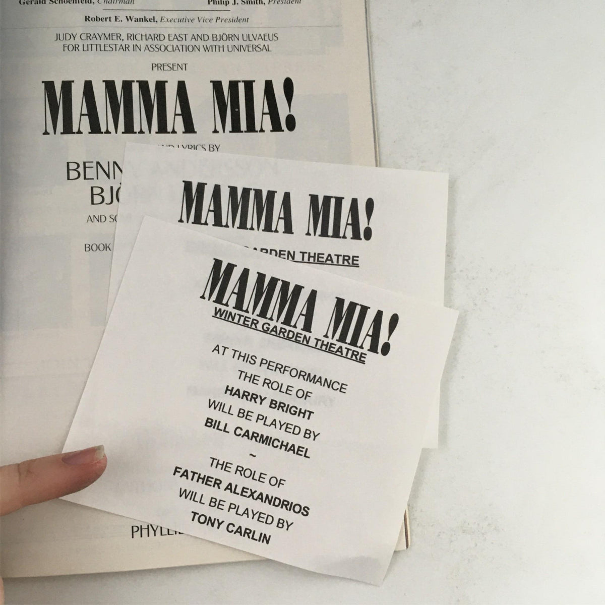 2002 Playbill Mamma Mia! by Phyllida Lloyd at Cadillac Winter Garden Theatre, featuring cast listings including Harry Bright and Father Alexandrios.