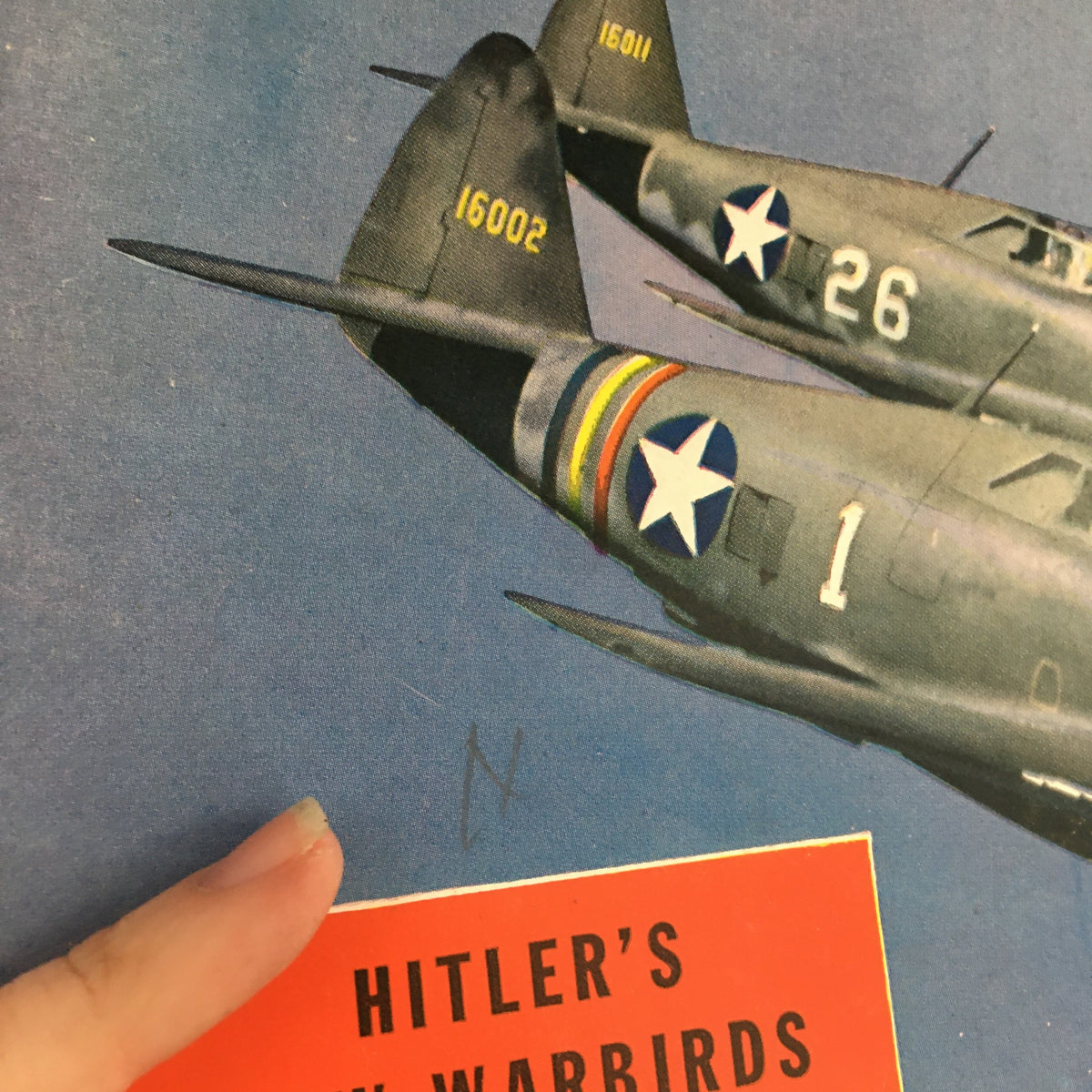 Close-up of the cover detail from Air Progress Magazine May 1943, highlighting the text 'Hitler's New Warbirds'.