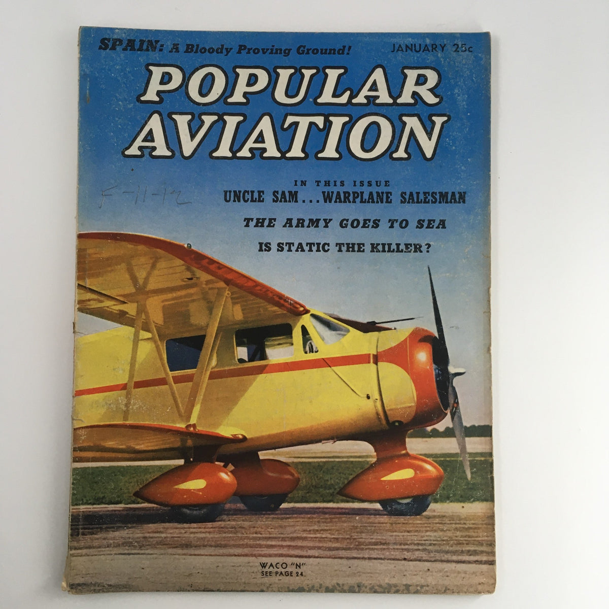 Popular Aviation Magazine January 1938 Vol 22 #1 cover featuring an illustration of a yellow aircraft and the title 'Uncle Sam Warplane Salesman'.