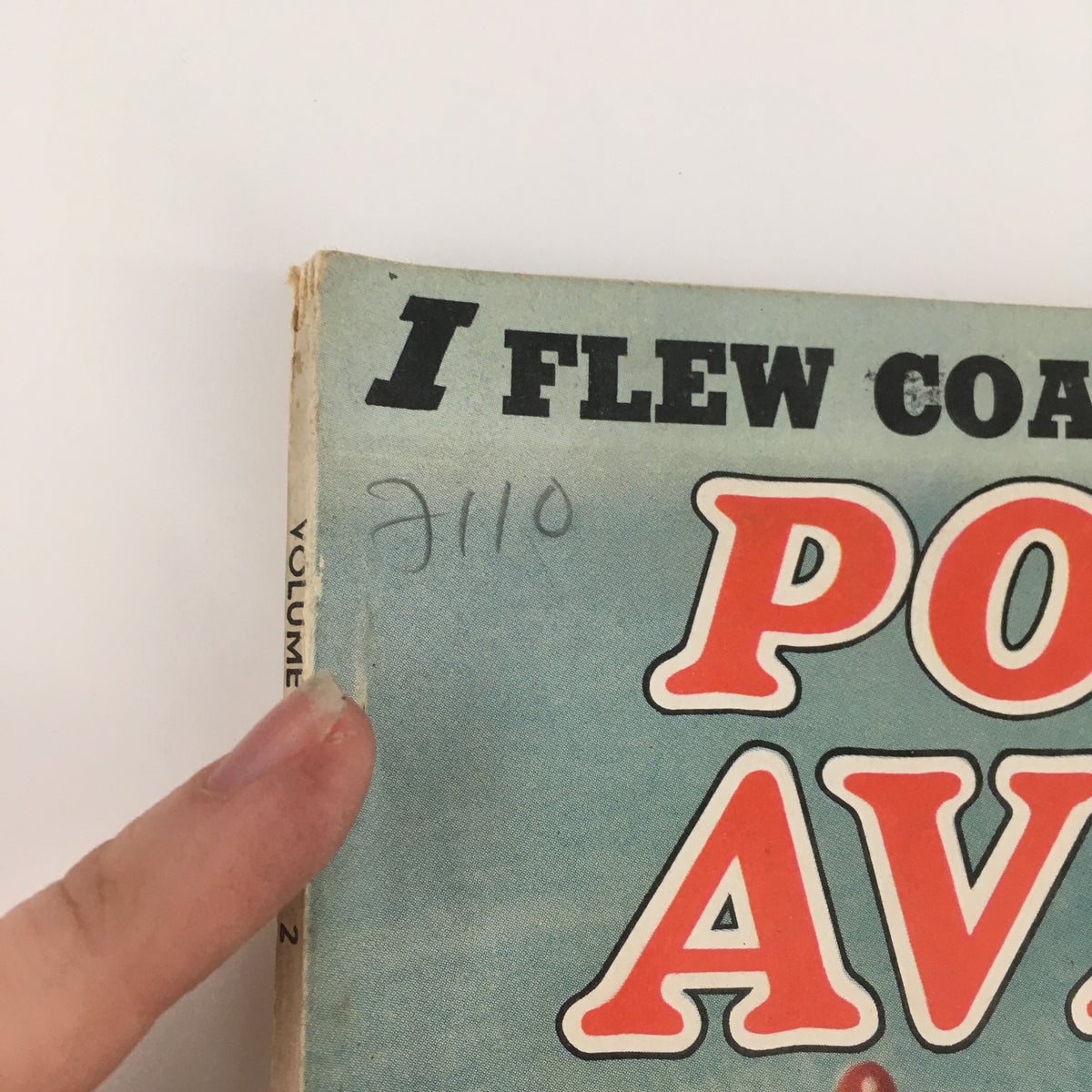 Close-up of the spine of the Popular Aviation Magazine February 1939 Vol 24 #2, showcasing handwritten notes and a vintage design.