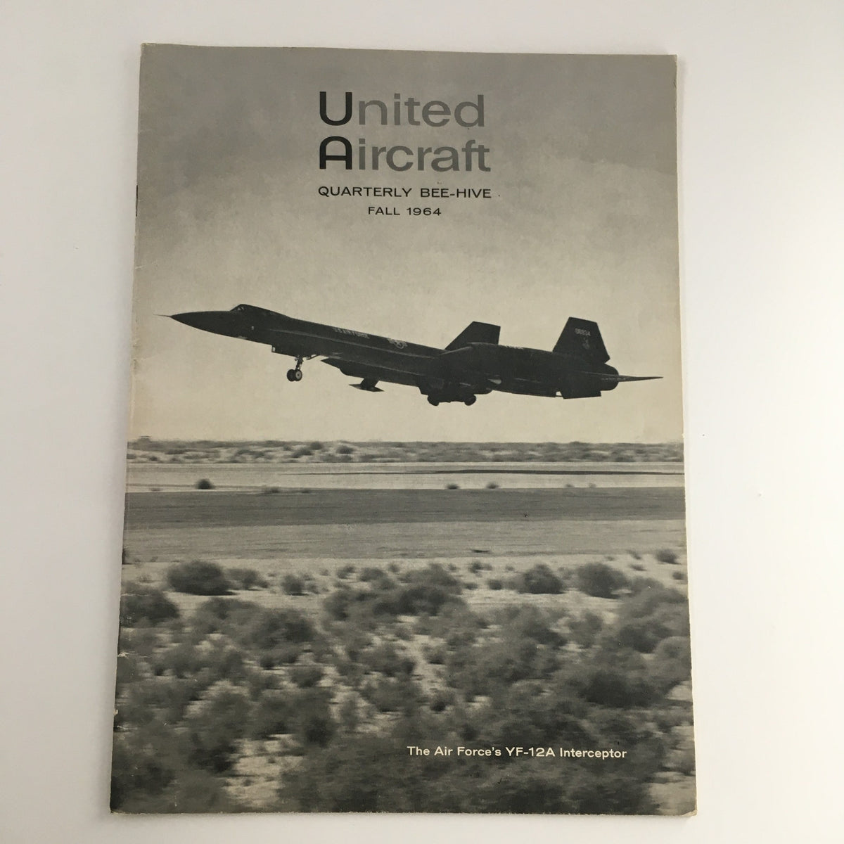 Cover of United Aircraft Magazine Fall 1964 Vol 39 #5 featuring the Air Force's YF-12A Interceptor, showcasing the aircraft in flight with desert background.
