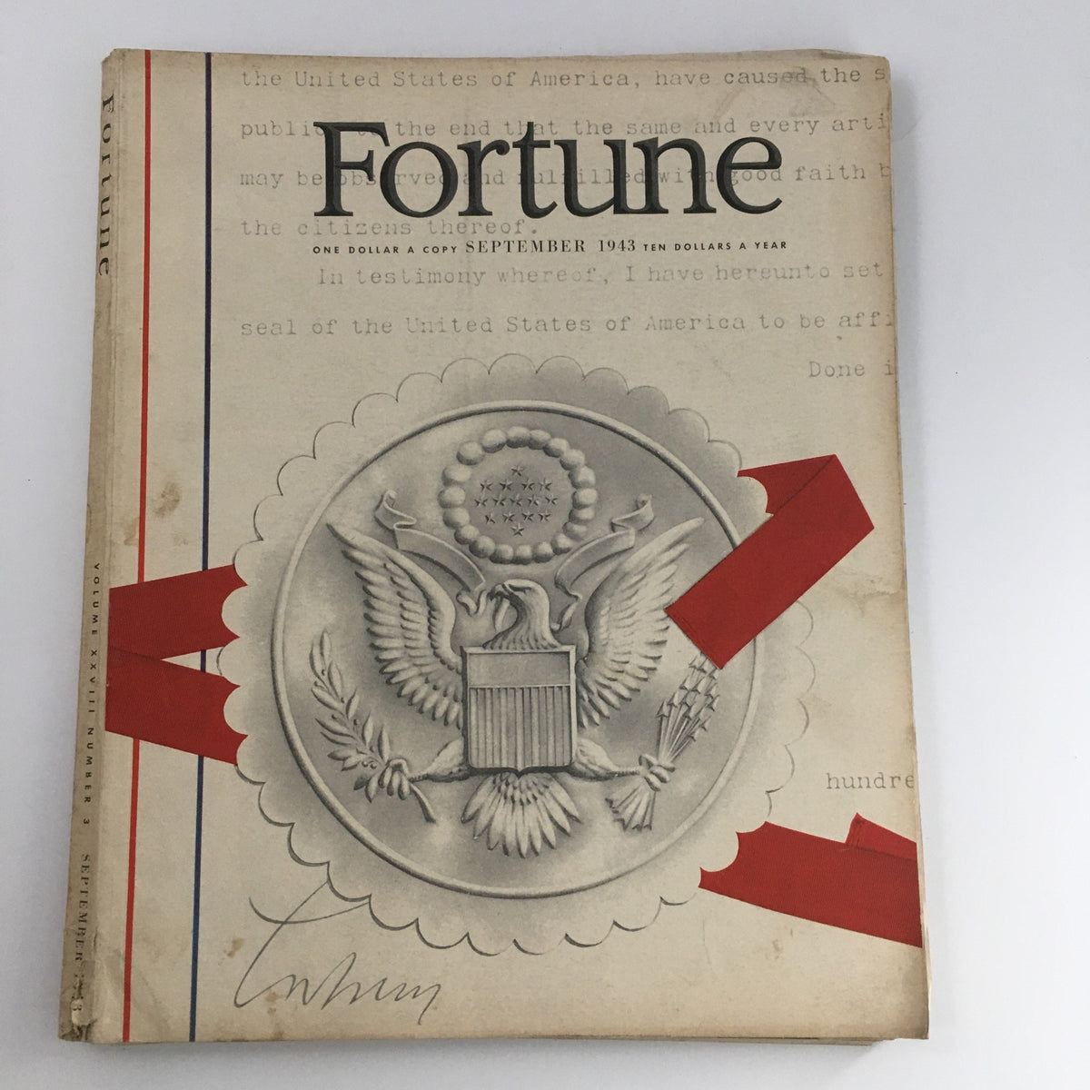 Cover of VTG Fortune Magazine September 1943 featuring the emblem of the United States and red ribbon design, highlighting the publication's focus on military strategies.