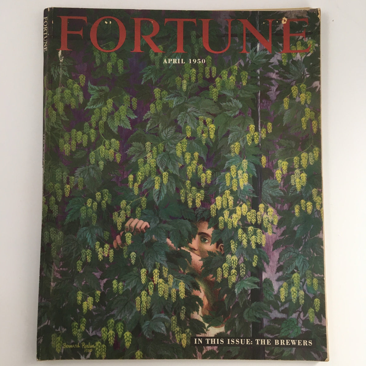 Vintage Fortune Magazine cover from April 1950, titled 'Picking the Hops,' featuring artwork by Bernard Perlin. The cover displays lush greenery and a hidden figure among hop plants.