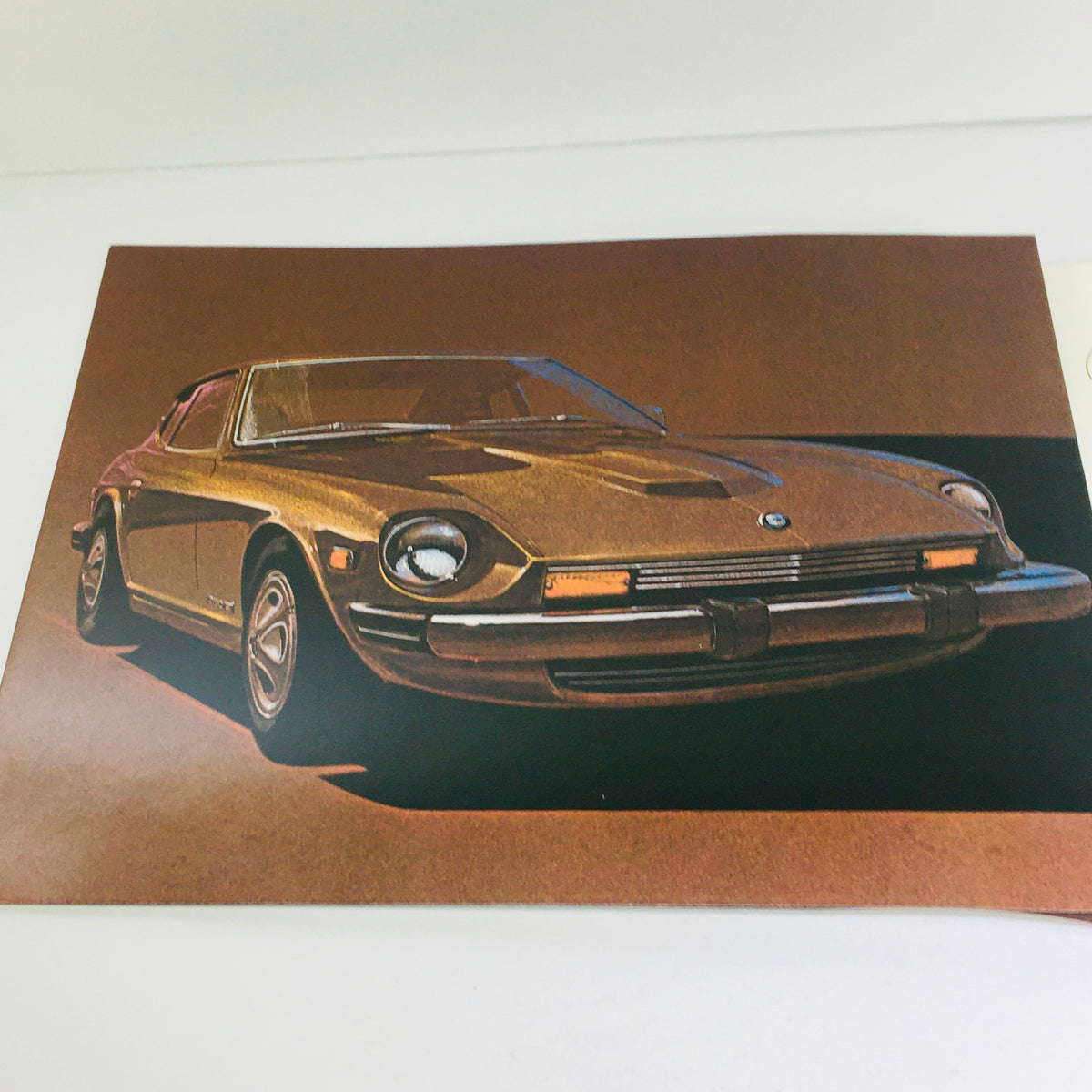 Illustration of the 1976 Datsun 280-Z showcasing its sleek design, as seen in the showroom brochure.