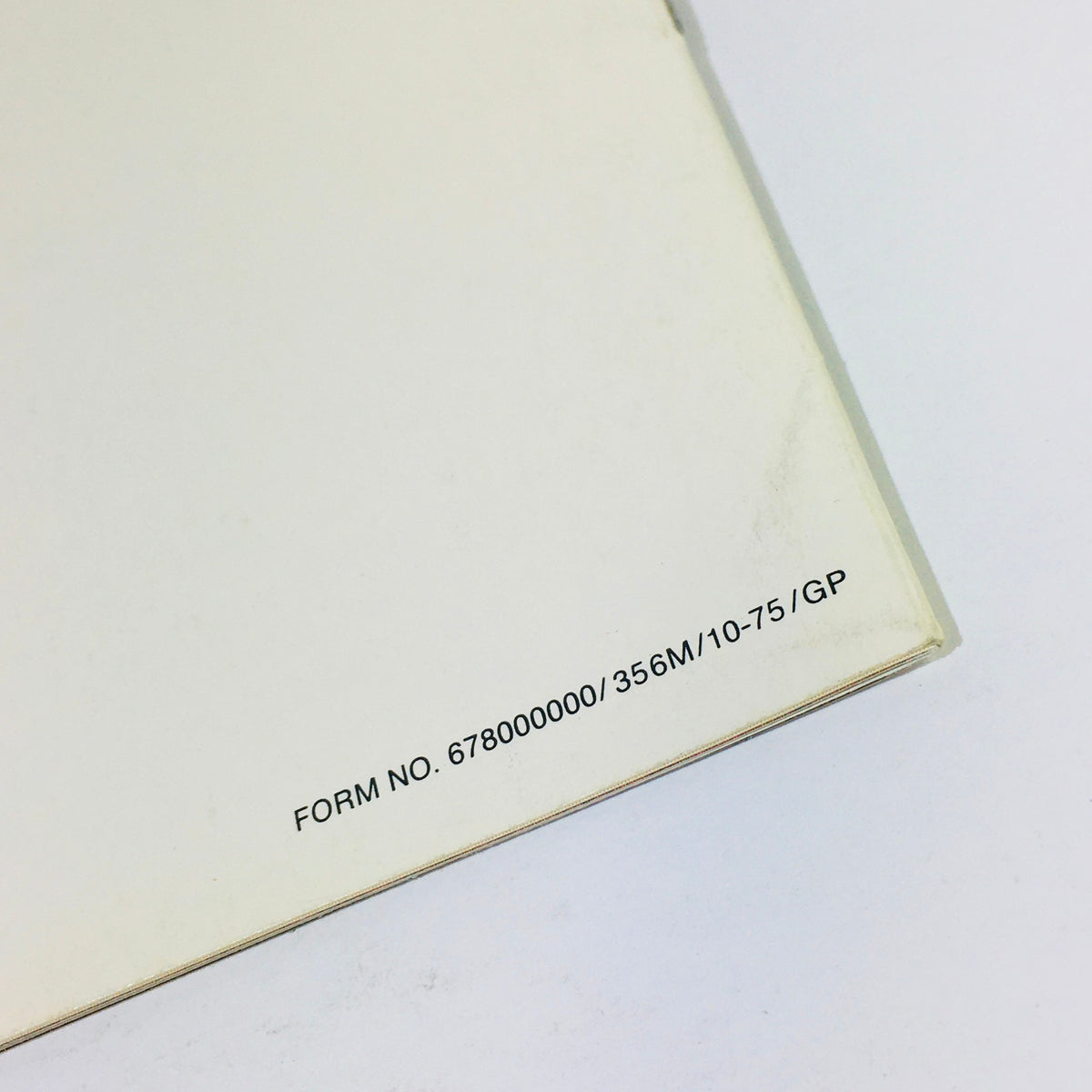 Close-up of the form number on the 1976 Datsun 280-Z Showroom Specifications brochure, indicating production details.