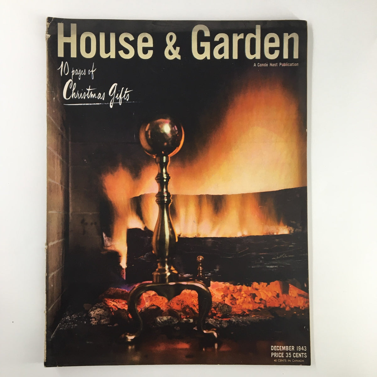 Cover of VTG House & Garden Magazine December 1943 featuring 10 pages of Christmas Gifts, showcasing a cozy fireplace scene.
