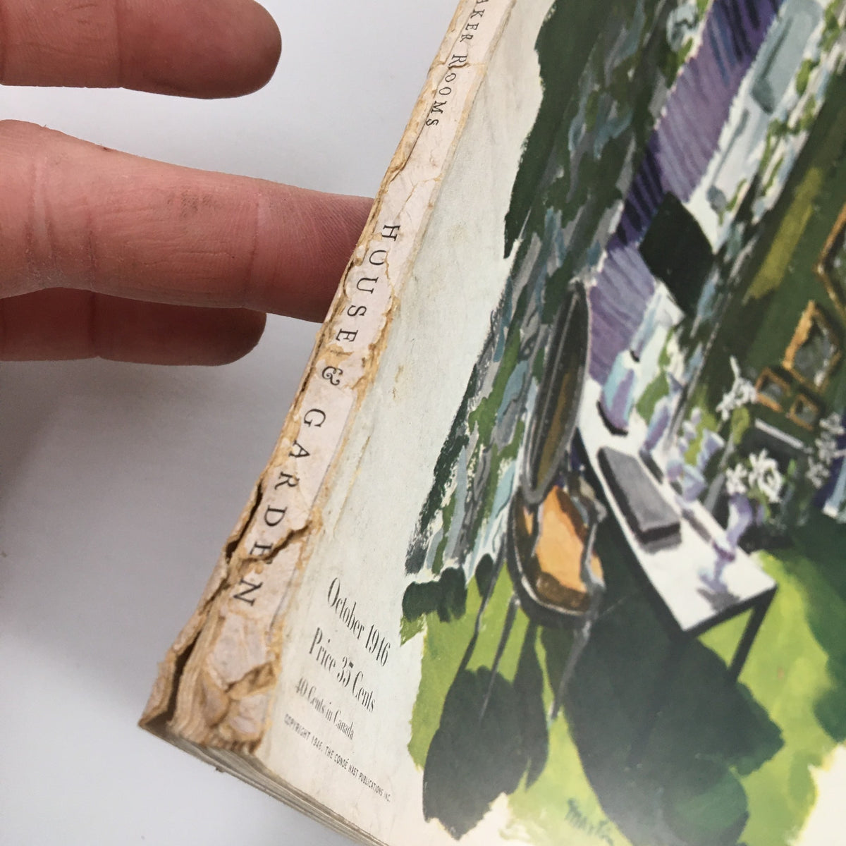 Side view of the VTG House & Garden Magazine, October 1946, highlighting minor wear along the binding, featuring the title and details of the issue.