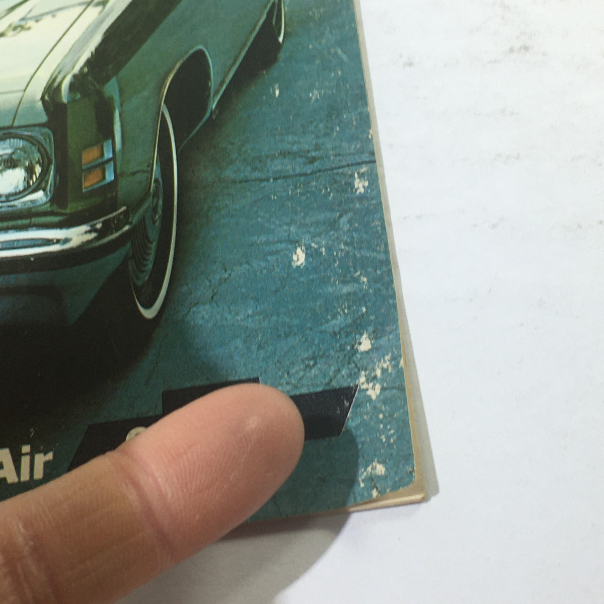 Close-up of the 1972 Chevrolet Caprice/Impala/Bel Air List Dealership Car Auto Brochure Catalog showing details of the car's wheel and cover.