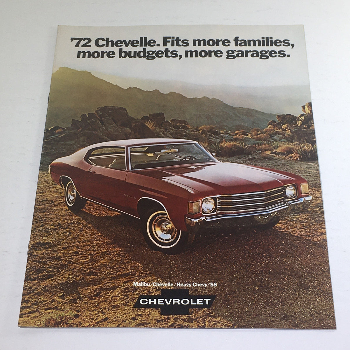 1972 Chevrolet Malibu/Chevelle/Chevy/SS Dealership Car Auto Brochure Catalog featuring a red 1972 Chevelle parked on rocky terrain with a backdrop of mountains.
