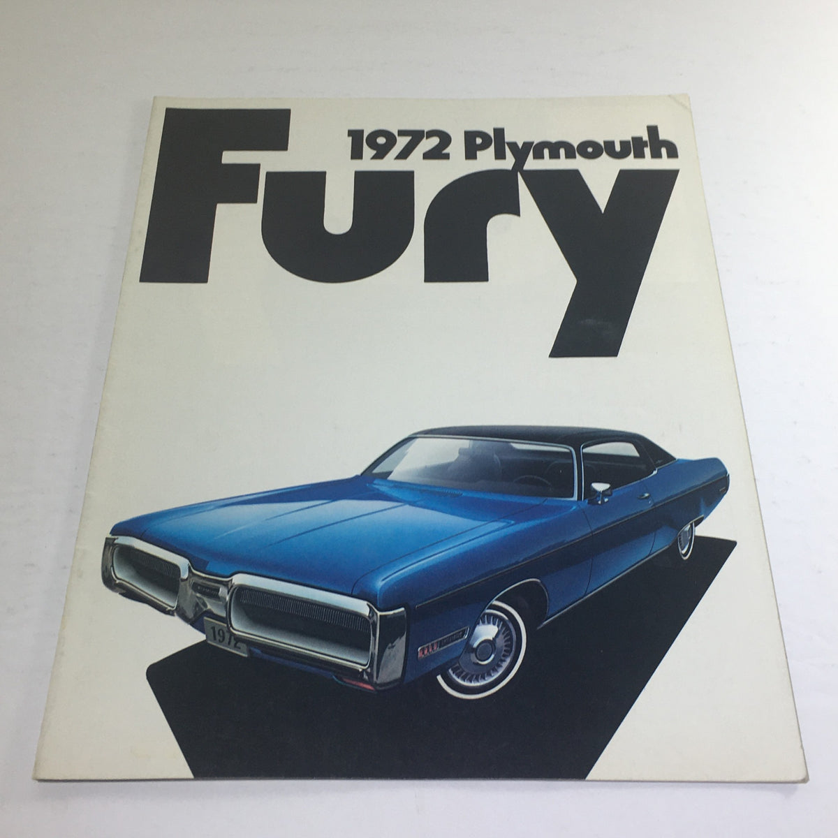 1972 Plymouth-Chrysler Fury Gran Coupe dealership car auto brochure cover featuring a blue Plymouth Fury model.