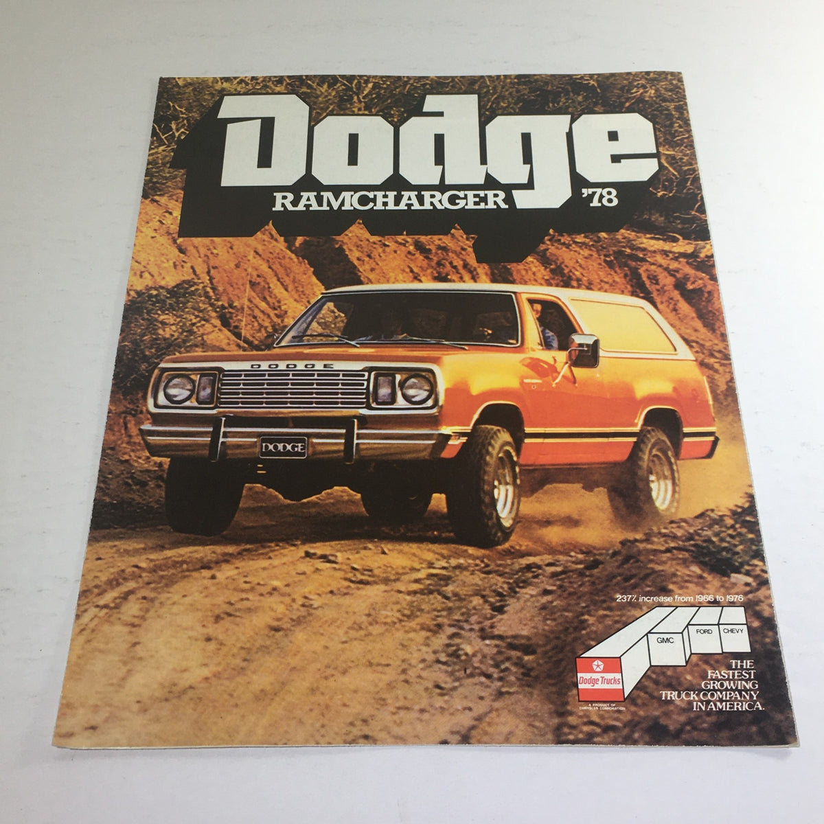 1978 Dodge Ramcharger 4x4 Truck Dealership Brochure Cover featuring an orange Ramcharger on a rugged terrain.