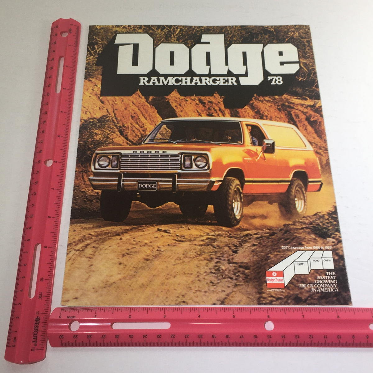 1978 Dodge Ramcharger 4x4 Truck Dealership Brochure Cover with a ruler for size reference, highlighting the orange Ramcharger.