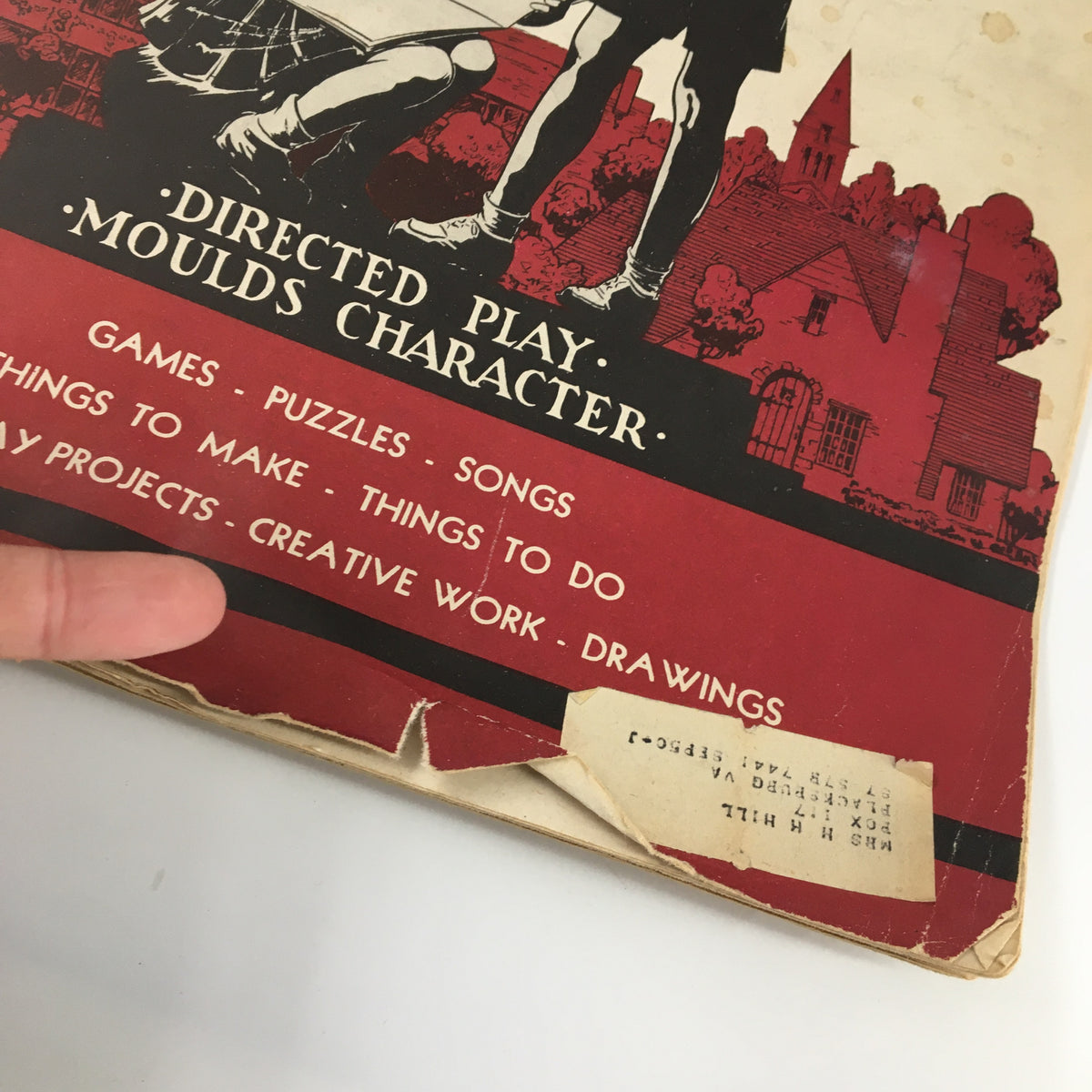 Close-up view of the cover of Children's Activities Magazine February 1948, showcasing details on directed play and character moulding, along with activity themes.