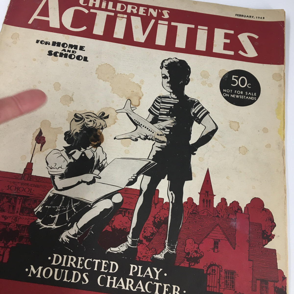 Another angle of Children's Activities Magazine February 1948 illustrating children involved in creative play, with prominent titles on games and educational activities.