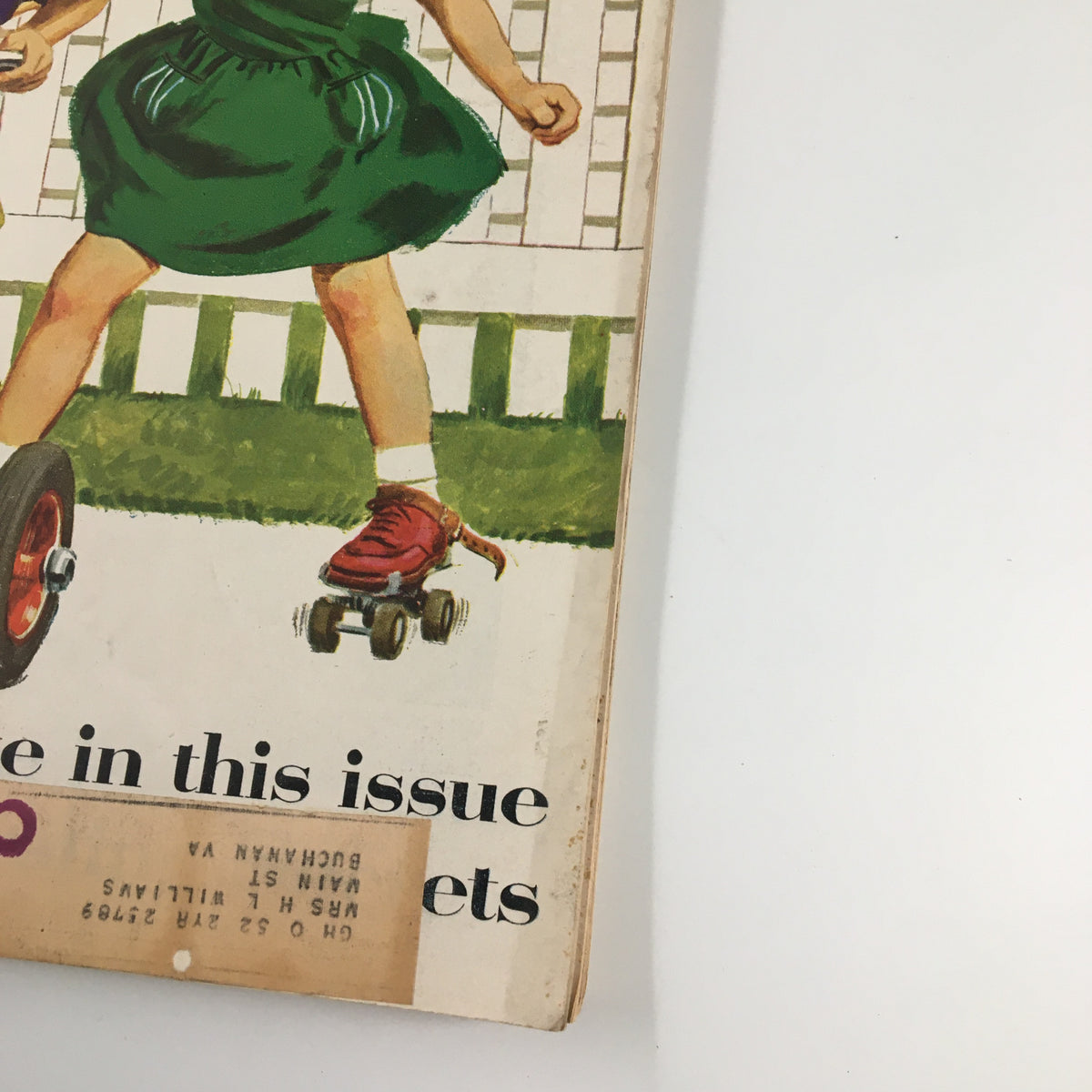 Close-up of the children on the cover of Good Housekeeping Magazine August 1952, highlighting the girl in a green dress and the boy in yellow overalls.