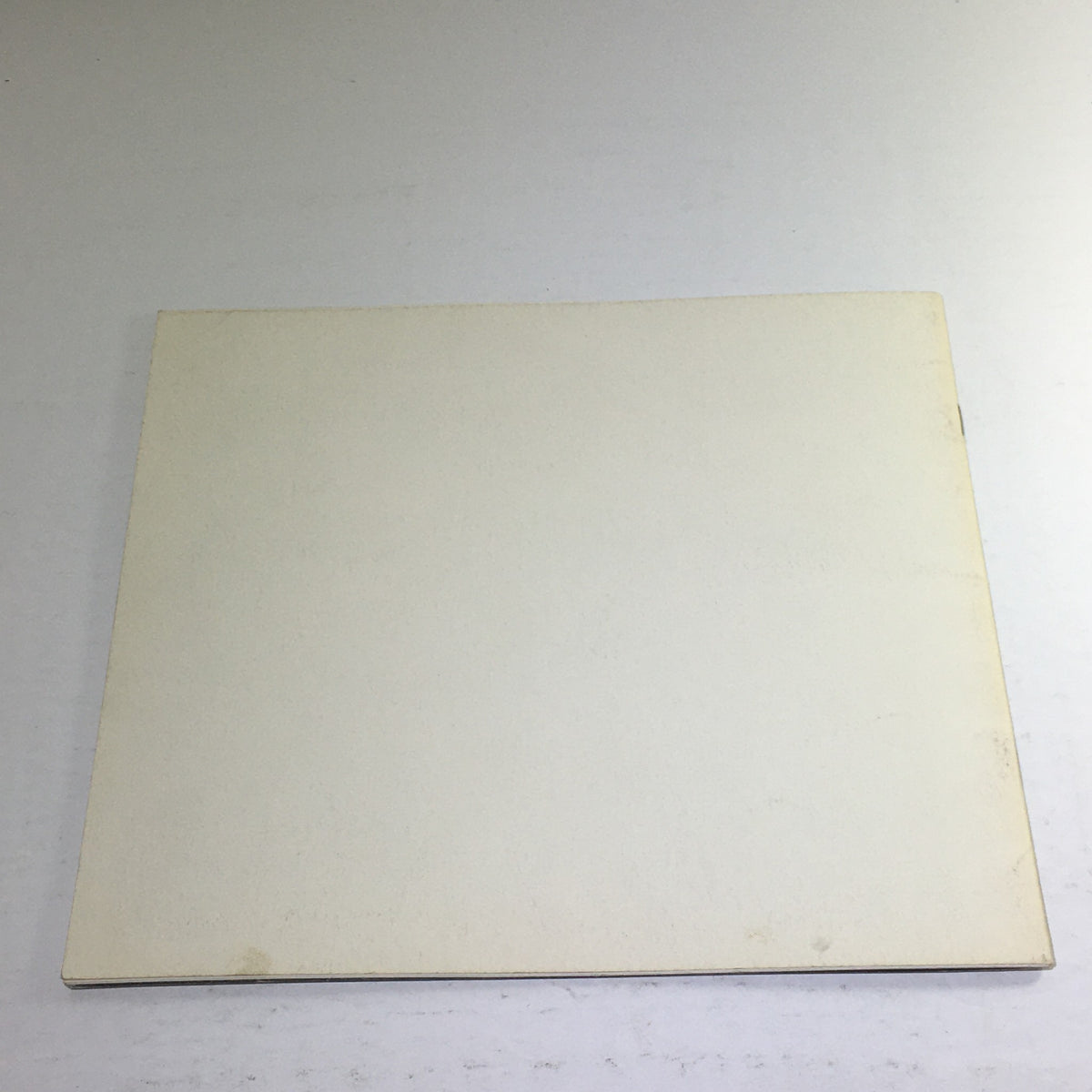 Back cover of the 1975 Cadillac American-Built Showroom Dealership Car Auto Brochure Catalog, plain design without graphics.