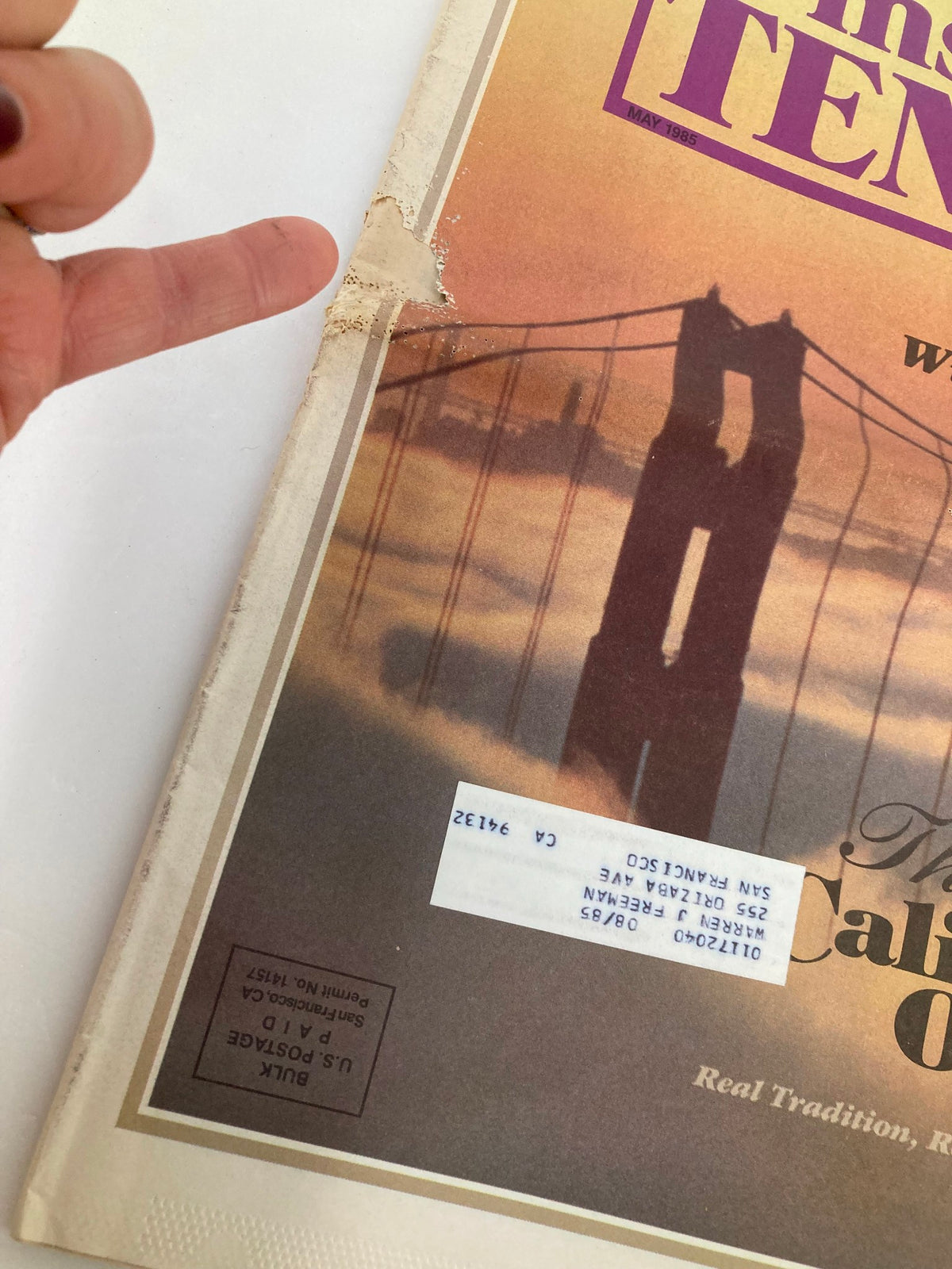 Detailed view of the Inside Tennis magazine cover from May 1985, showcasing the title 'Can John McEnroe Win The French?' alongside visible wear and an address label.