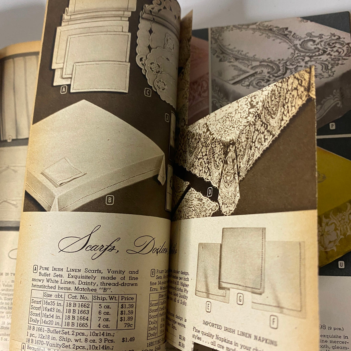 Close-up view from the 1949-1950 Montgomery Ward Baltimore Fall and Winter Catalog displaying an assortment of fine Irish linen scarves and doilies.