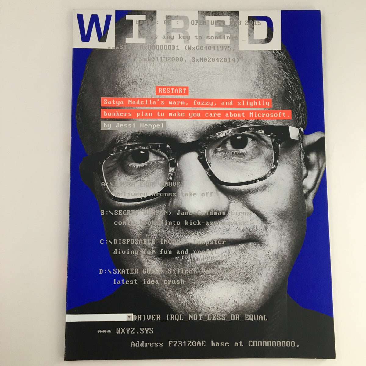 Cover of Wired Magazine February 2015 featuring Satya Nadella's bonkers plan about Microsoft, emphasizing technology and innovation with a creative design.