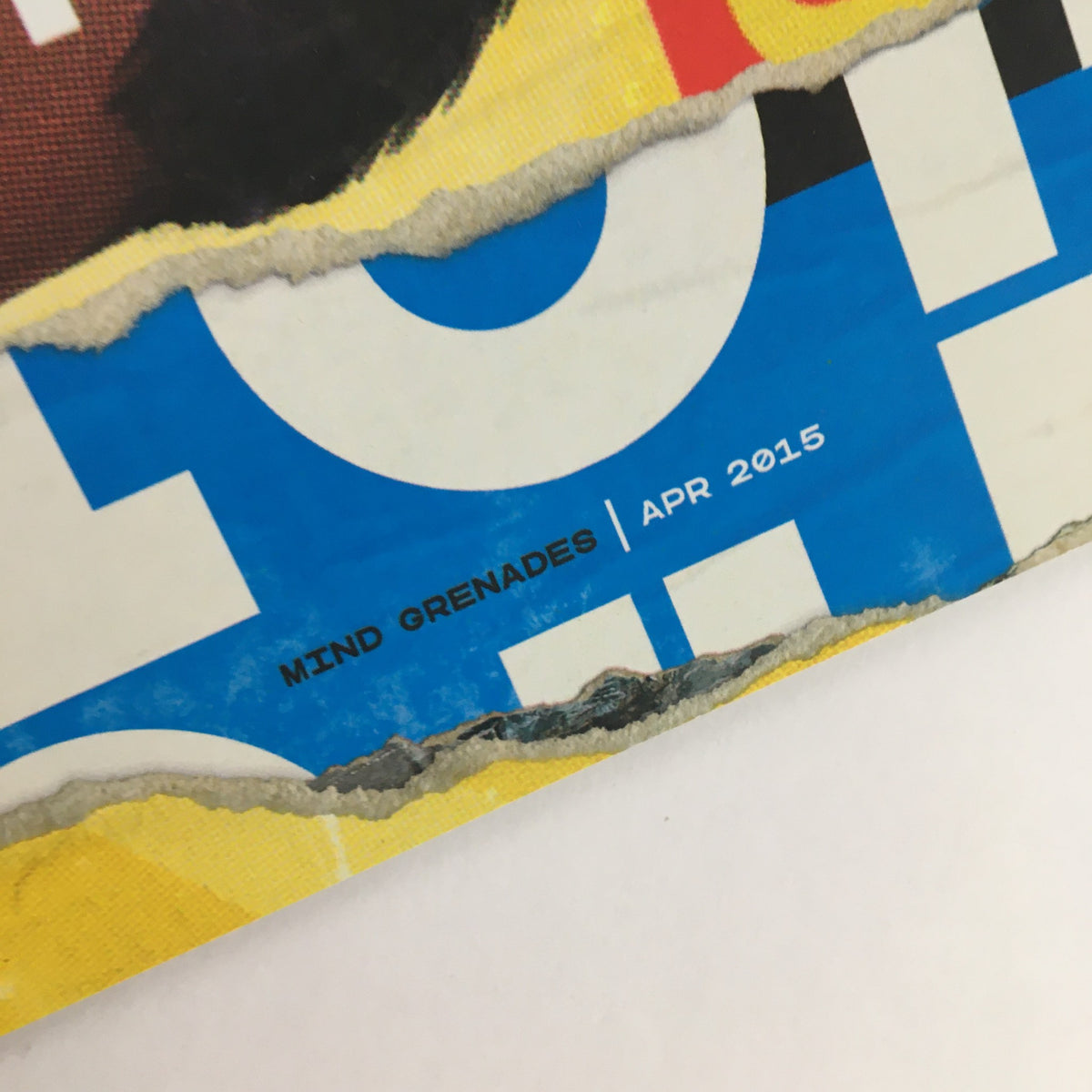 Close-up of the bottom corner of Wired Magazine April 2015 showing the date 'APR 2015' and the words 'MIND GRENADES'.