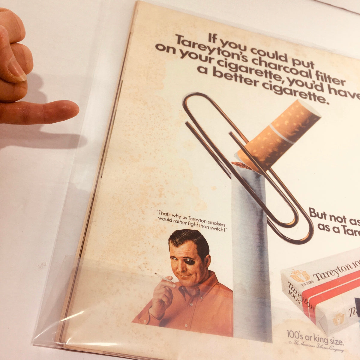 Inside page of the Vintage Life Magazine January 10, 1969 showing a Tareyton cigarette advertisement with a man smiling and holding a cigarette, promoting the charcoal filter.