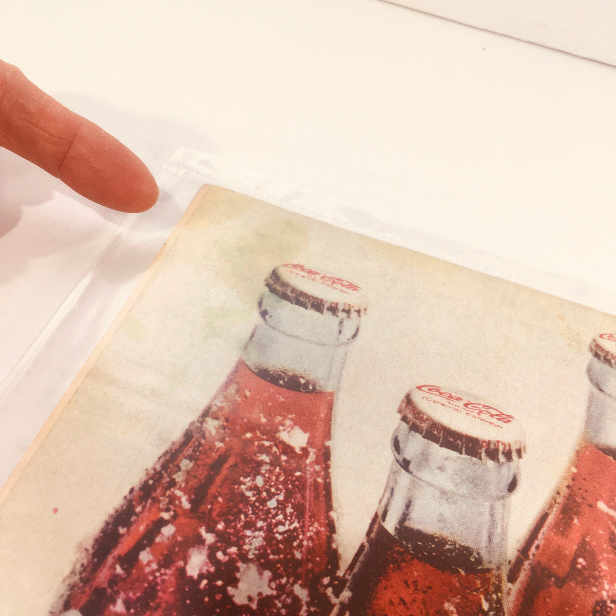 Inside view of VTG Life Magazine from December 26, 1969 showing vintage Coca-Cola bottles, illustrating the era's advertisements.