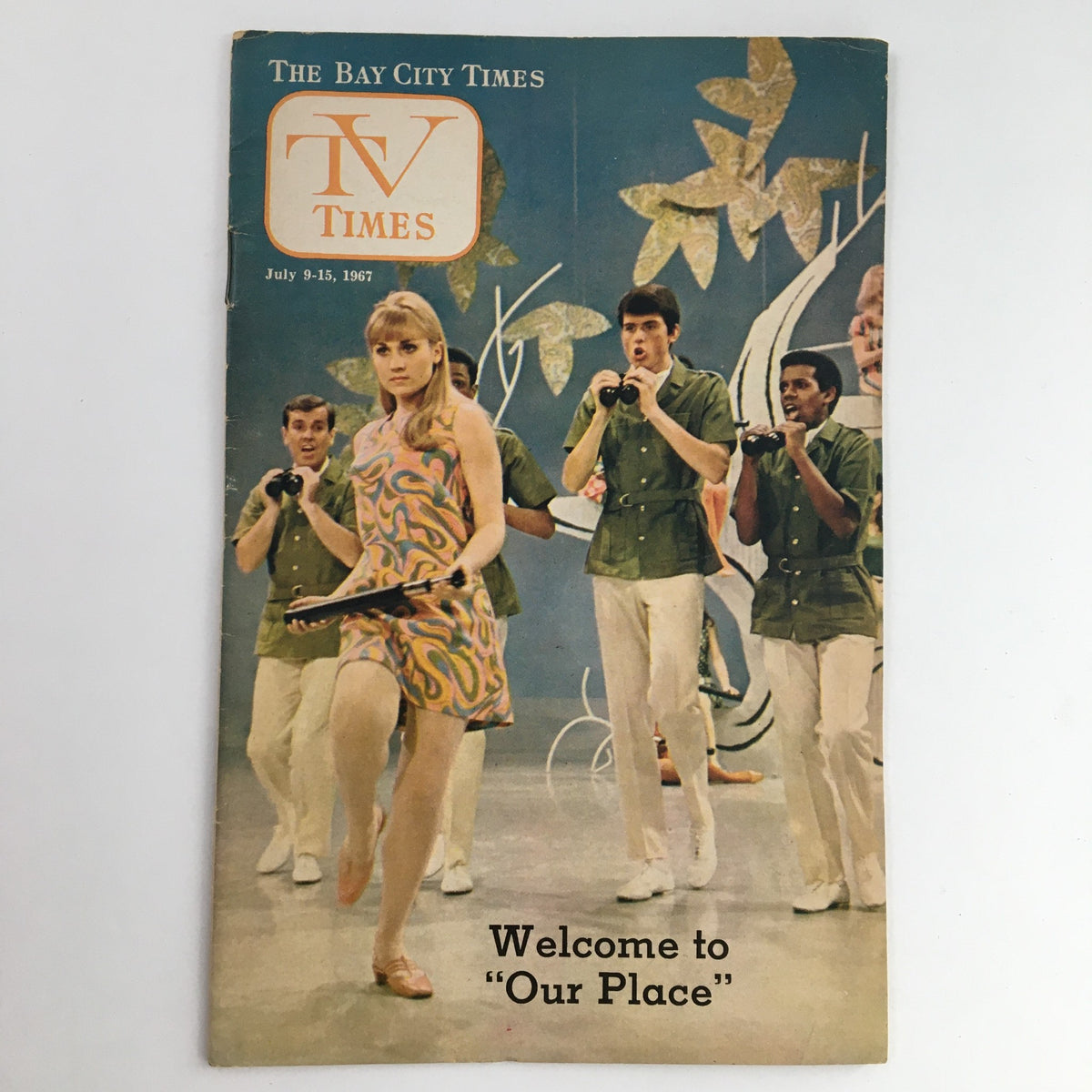 TV Times Bay City Michigan July 9-15, 1967 cover featuring a colorful vintage design with a dancer and performers, welcoming viewers to 'Our Place'.