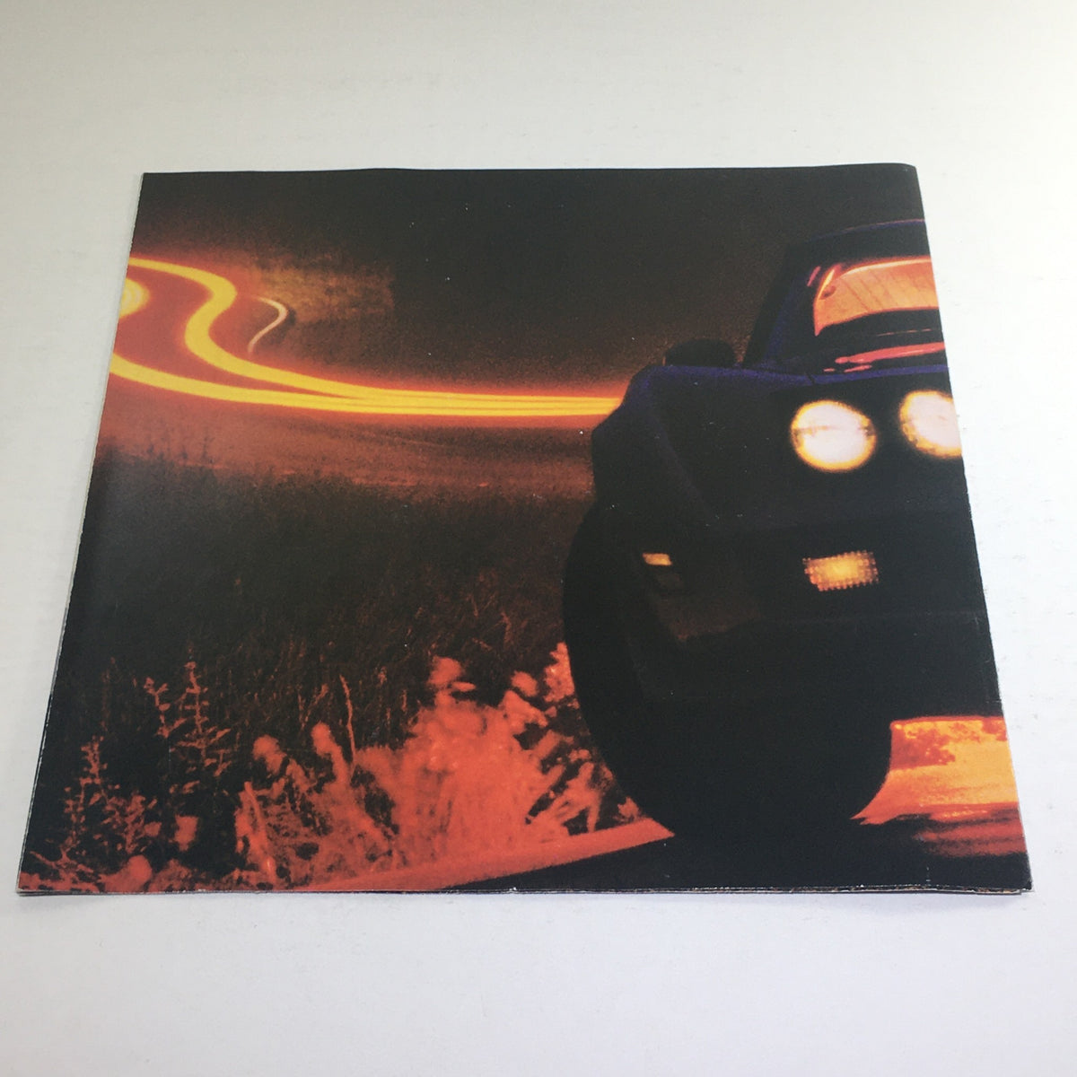 Back cover of the 1981 Chevrolet Corvette Dealership Car Auto Brochure Catalog with a dynamic image of a Corvette on a winding road.