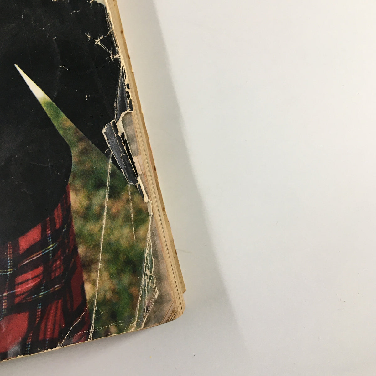 Close-up of the damaged cover of VTG Seventeen Magazine August 1968 featuring a memo from model Cheryl Tiegs, showcasing vintage wear and character