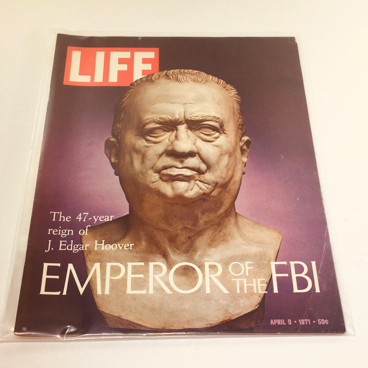 Vintage Life Magazine cover from April 9, 1971, featuring a bust of J. Edgar Hoover with the title 'EMPEROOR OF THE FBI' and highlighting his 47-year reign. This collectible issue provides historical insights into Hoover's legacy.