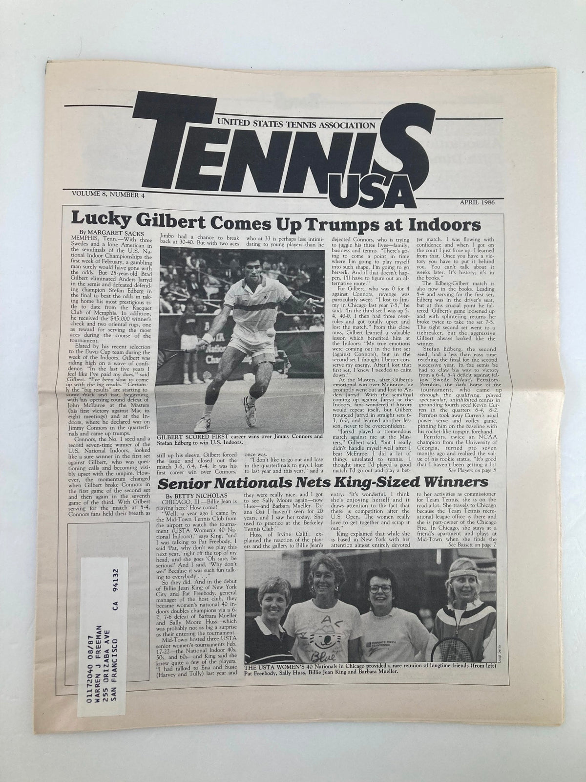 April 1986 issue of Vintage Tennis USA Magazine, Volume 8, Number 4, showcasing the article 'Lucky Gilbert Comes Up Trumps at Indoors' with images of players and event details, celebrating the competition between tennis legends.