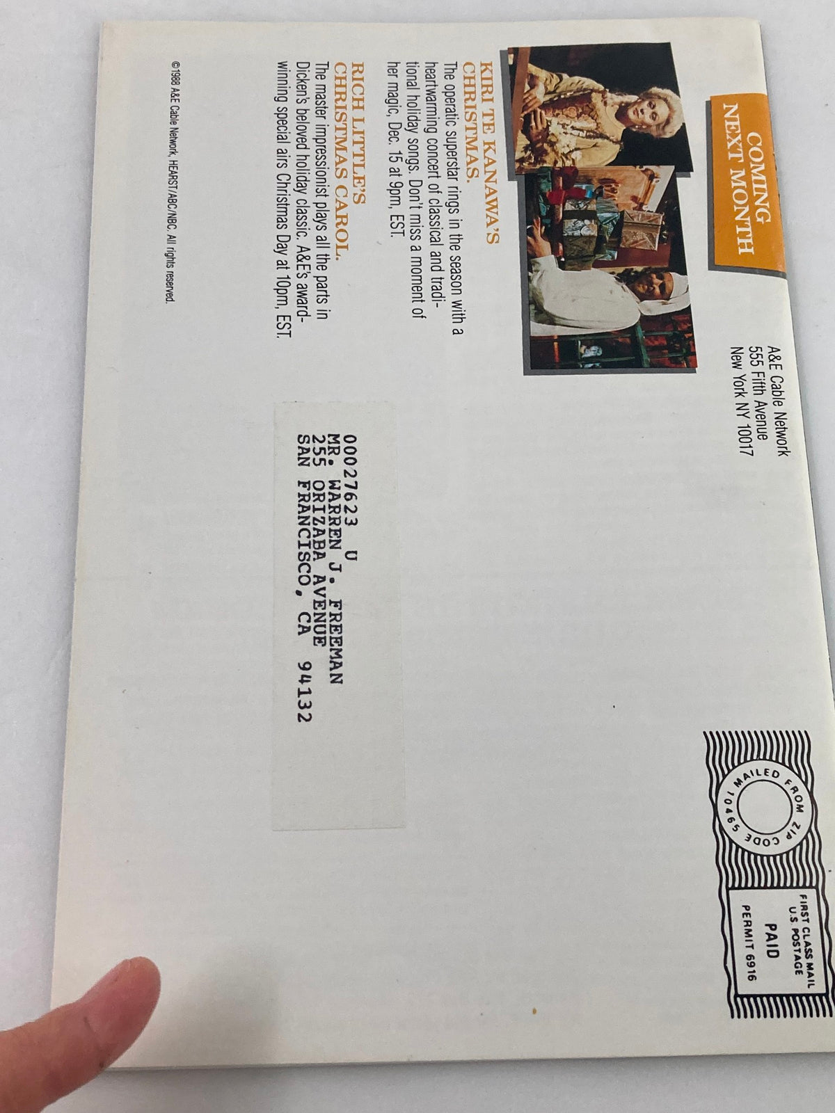 Back cover of the VTG A&E Cable Network Program Guide November 1988, showing promotional content and an address for A&E Cable Network, relevant for JFK Assassination programming.
