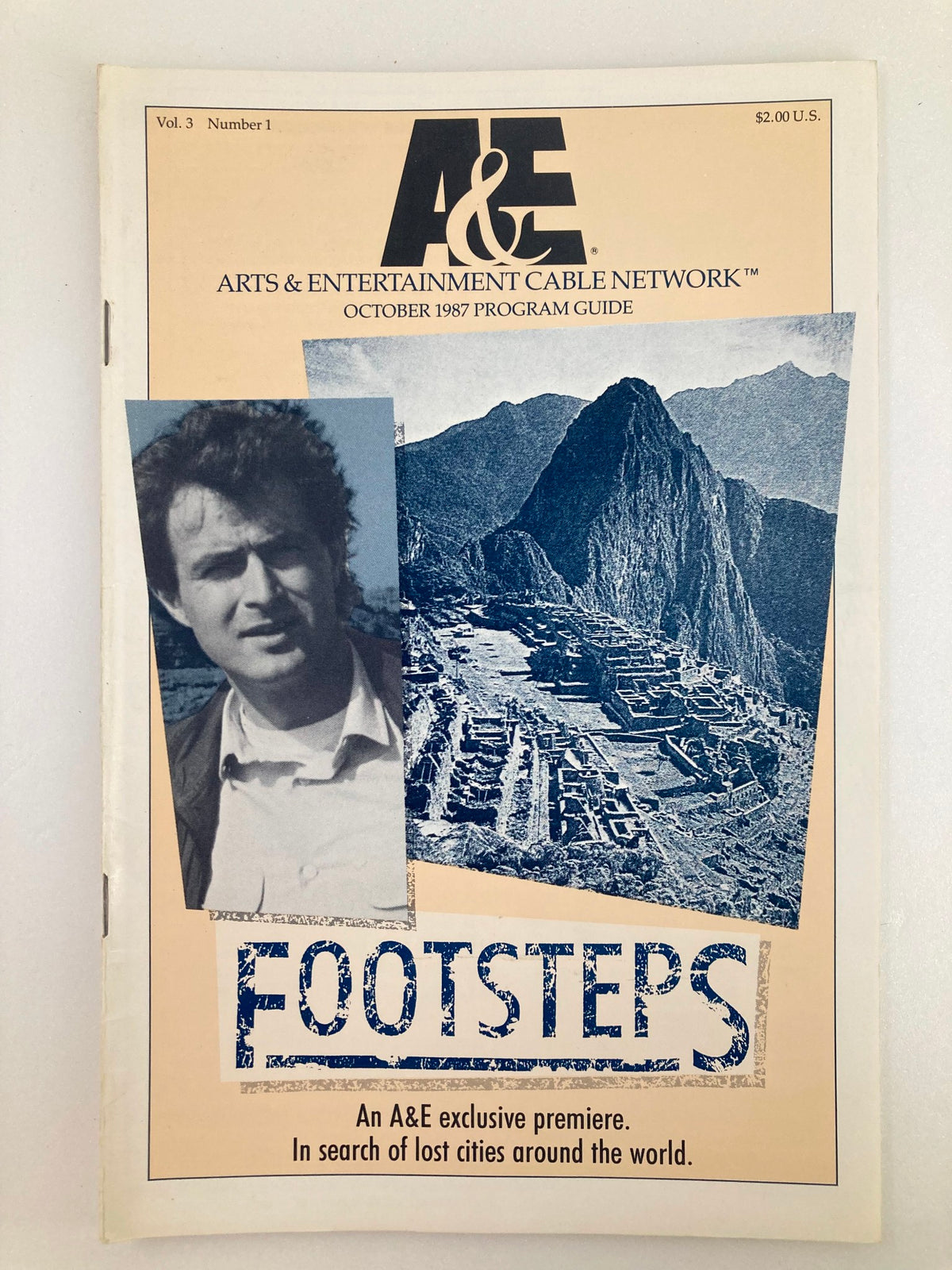 Cover of the VTG A&E Cable Network Program Guide for October 1987, Volume 3, Number 1, titled 'Footsteps', featuring a photograph and mountainous landscape.