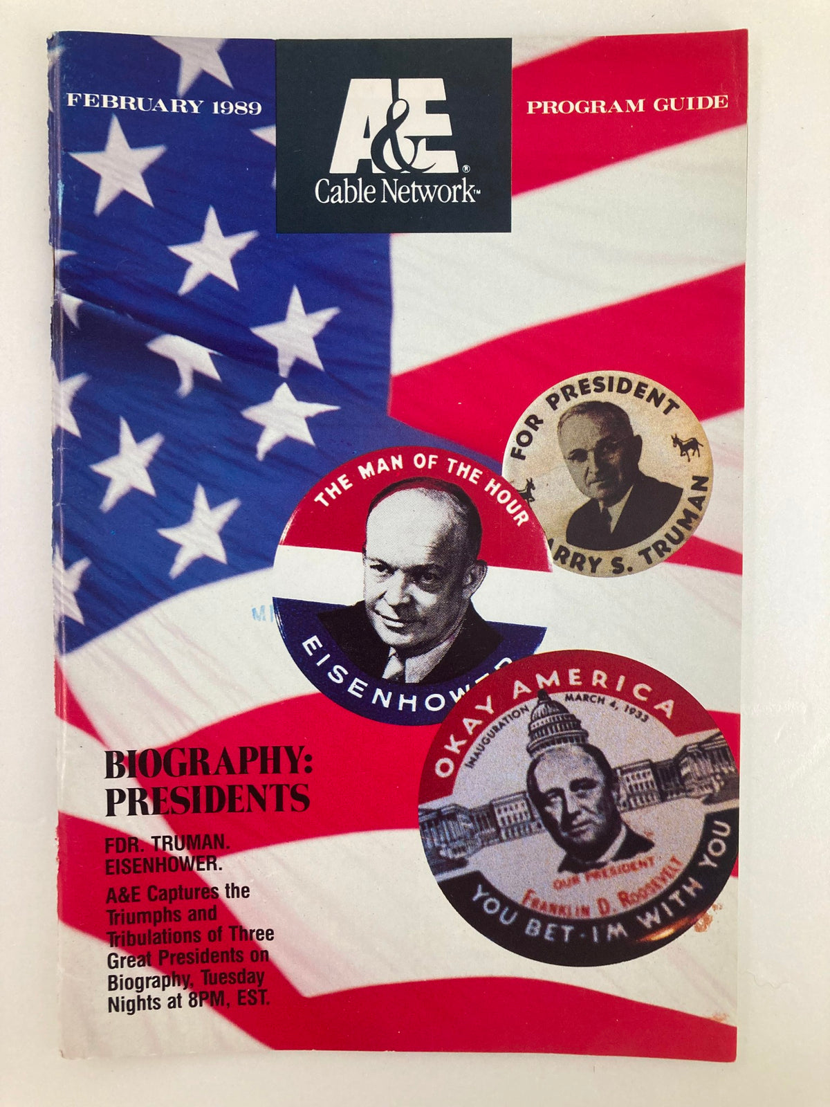 Vintage A&E Cable Network Program Guide from February 1989 featuring Dwight Eisenhower, set against a backdrop of the American flag, showcasing historical programming highlights.
