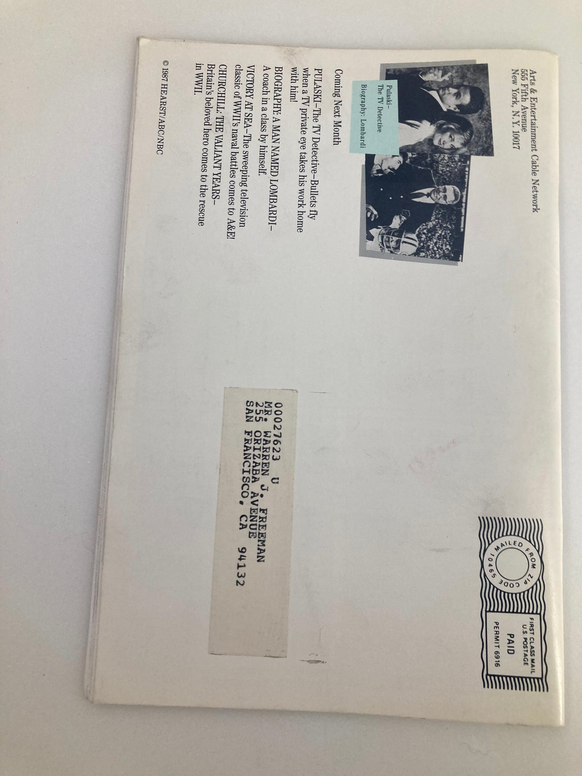 Back cover of the A&E Cable Network Program Guide - December 1987 showcasing promotional content and an address label, providing historical context of the magazine.