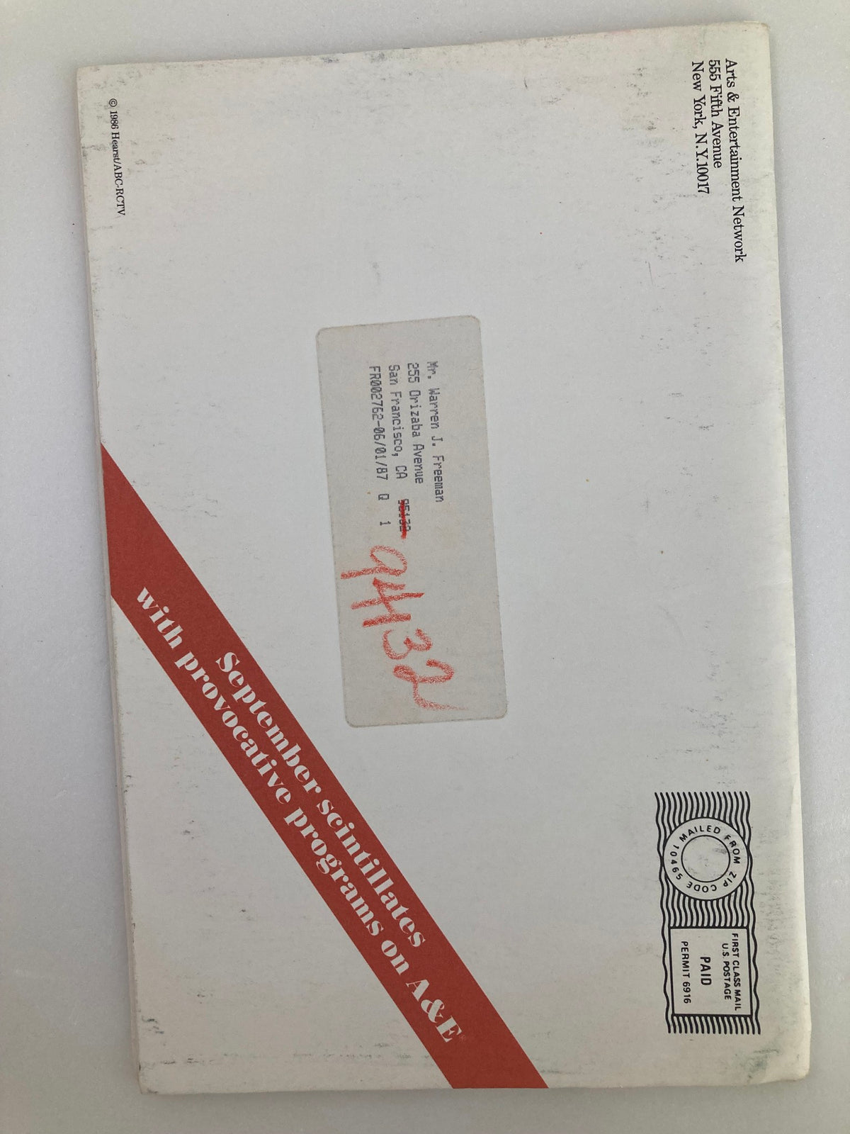 Back cover of the September 1986 VTG A&E Cable Network Program Guide displaying address information and red diagonal stripe graphic, highlighting A&E's promotional content related to vintage programs.