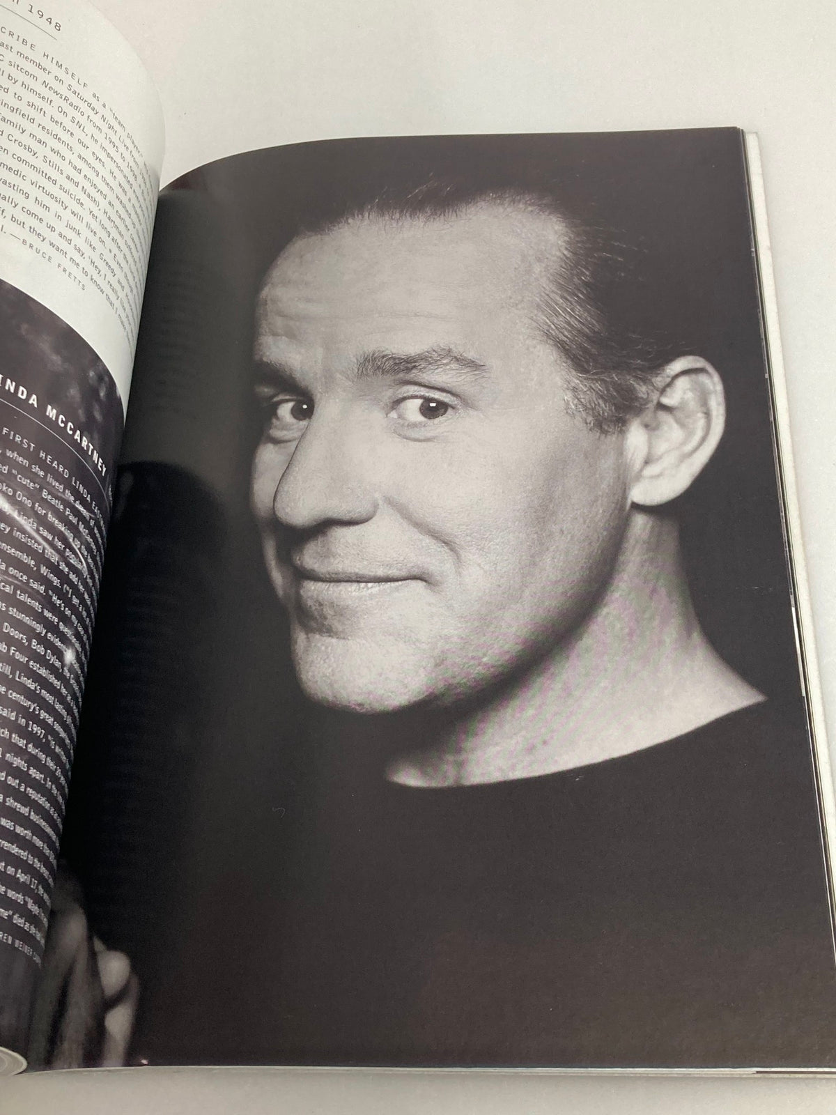 An insightful black and white portrait featured in the VTG Entertainment Weekly Yearbook 1999, likely showcasing a prominent figure in the entertainment world.
