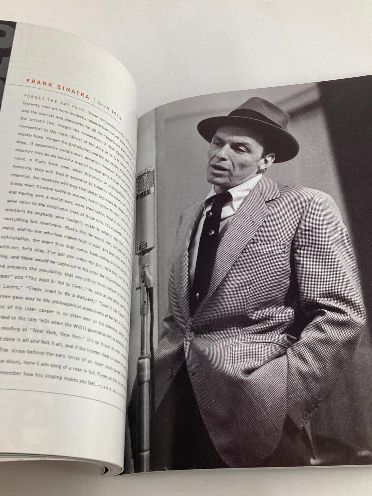 Image from VTG Entertainment Weekly Yearbook 1999 featuring an article on Frank Sinatra, showcasing a black and white photograph of Sinatra in a classic suit and hat.