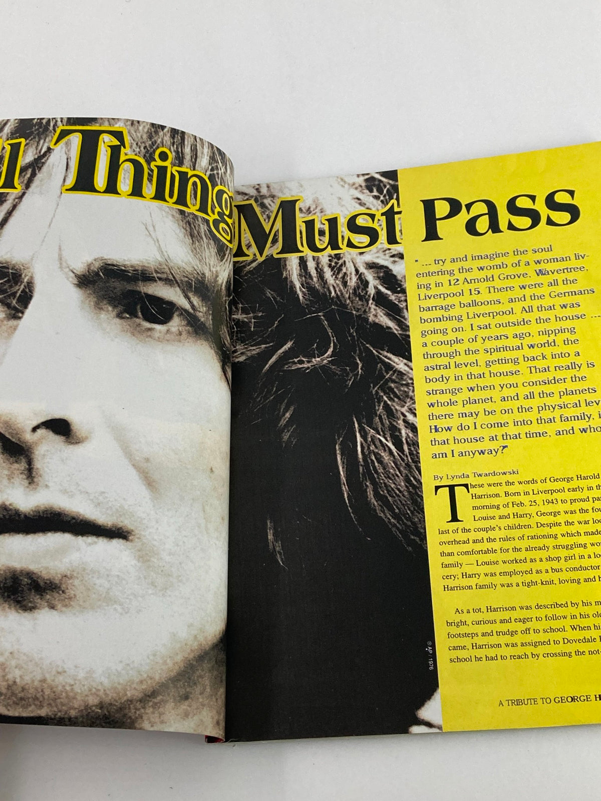 Page from Gold Collectors Series Magazine 2001: A Tribute To George Harrison discussing Harrison’s album 'All Things Must Pass' with a close-up image of George Harrison.