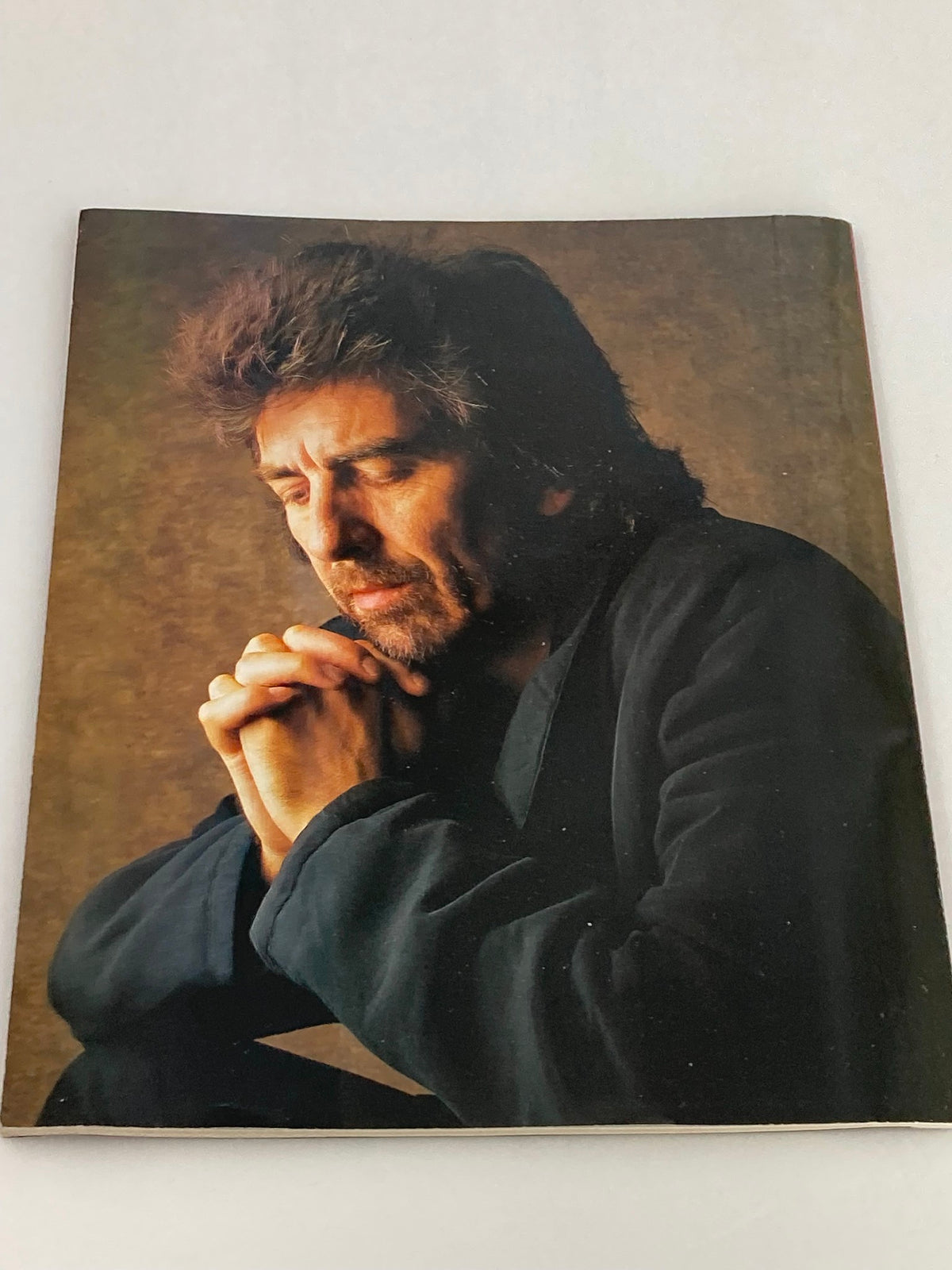 Cover of Rolling Stone Magazine special edition 2001 featuring George Harrison, presenting a serene portrait of Harrison with a contemplative expression.
