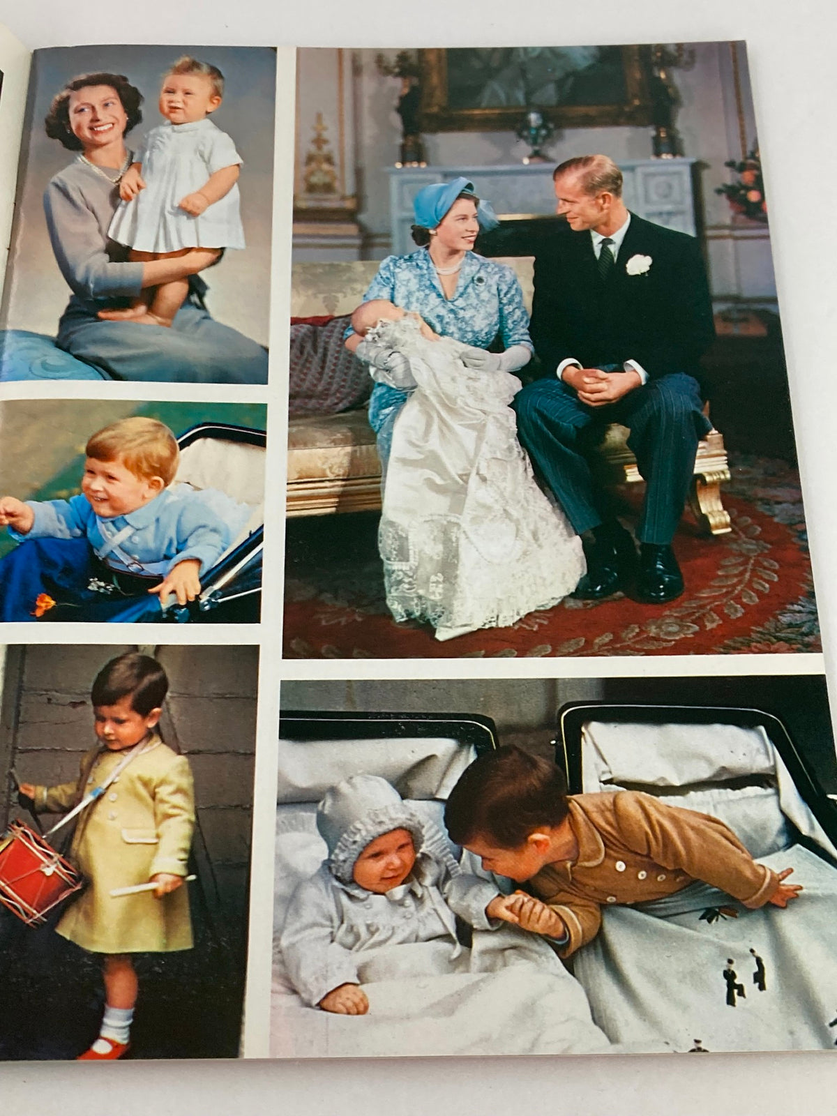VTG Royal Family Souvenir 1973 Picture Book Queen Elizabeth II & Prince Phillip featuring candid family moments, including a smiling Queen Elizabeth II and Prince Phillip with children and joyful interactions.