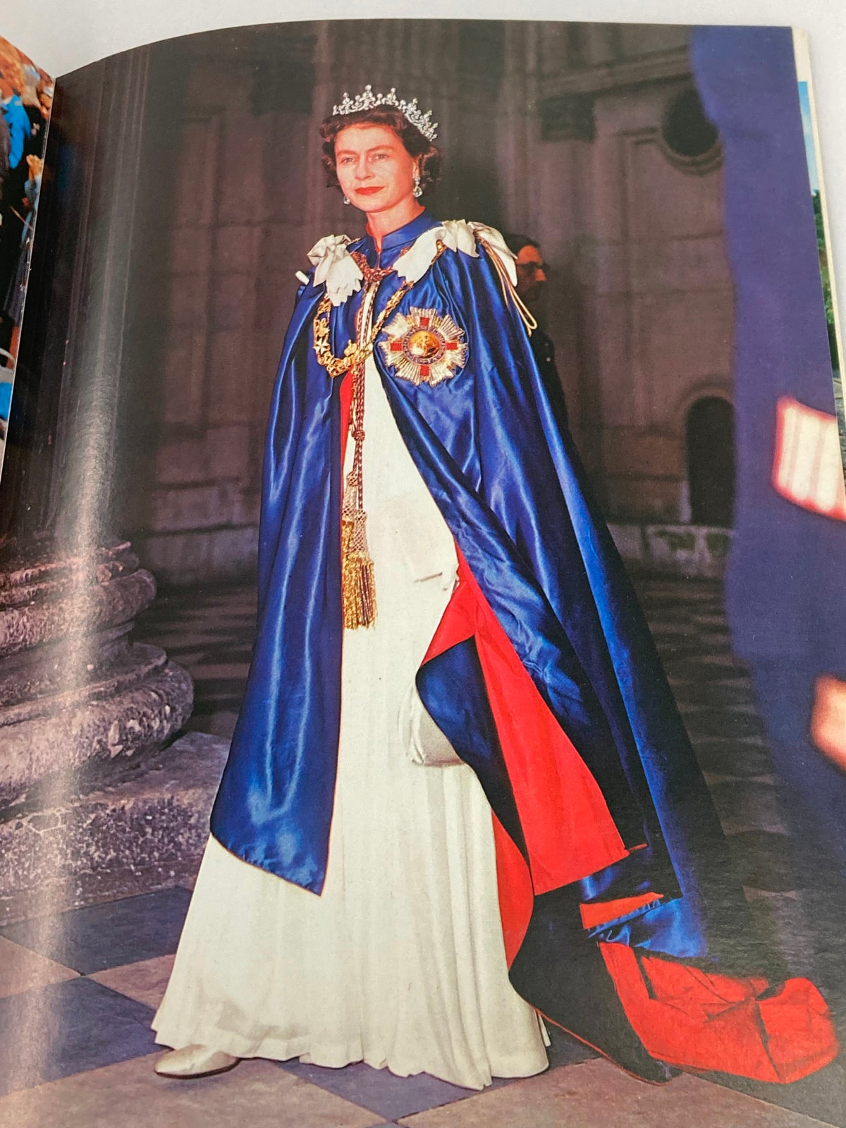 VTG Royal Family Souvenir 1973 Picture Book Queen Elizabeth II & Prince Phillip illustrating Queen Elizabeth II in an elegant gown and crown, embodying royal tradition and heritage.