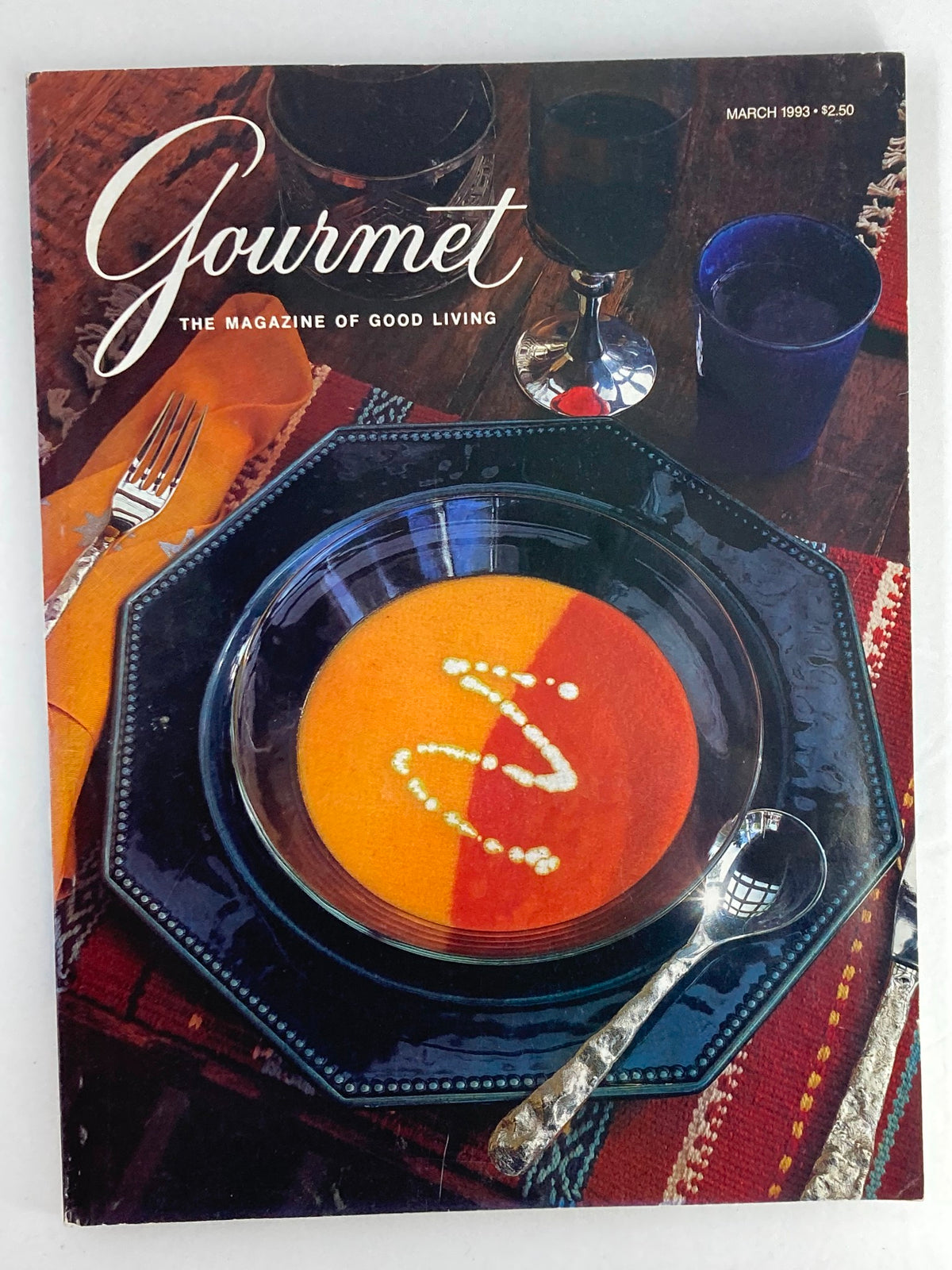 Cover of Gourmet Magazine March 1993 featuring a beautifully plated soup and a colorful table setting, highlighting 'The Marches of Italy Holidays'.