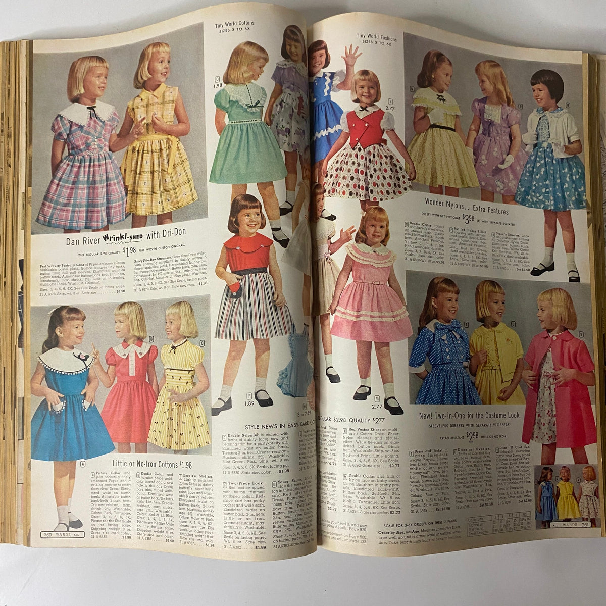 1958 Montgomery Ward Spring and Summer Catalog displaying children's summer dresses in vibrant colors and patterns for little girls.